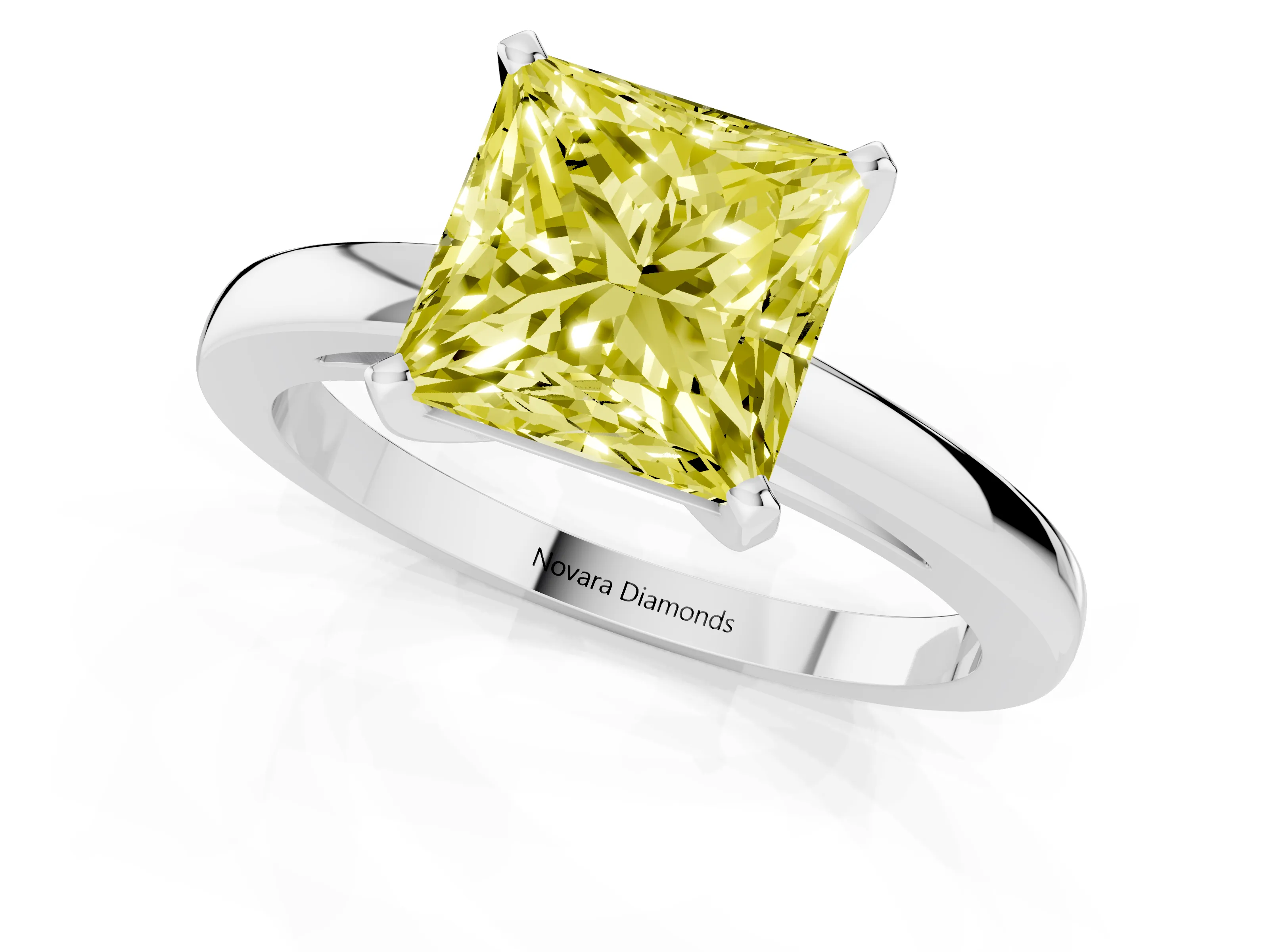 Fancy Yellow Princess Cut Diamond Solitaire Engagement Ring Set in White gold with Prong Setting on a Classic Band