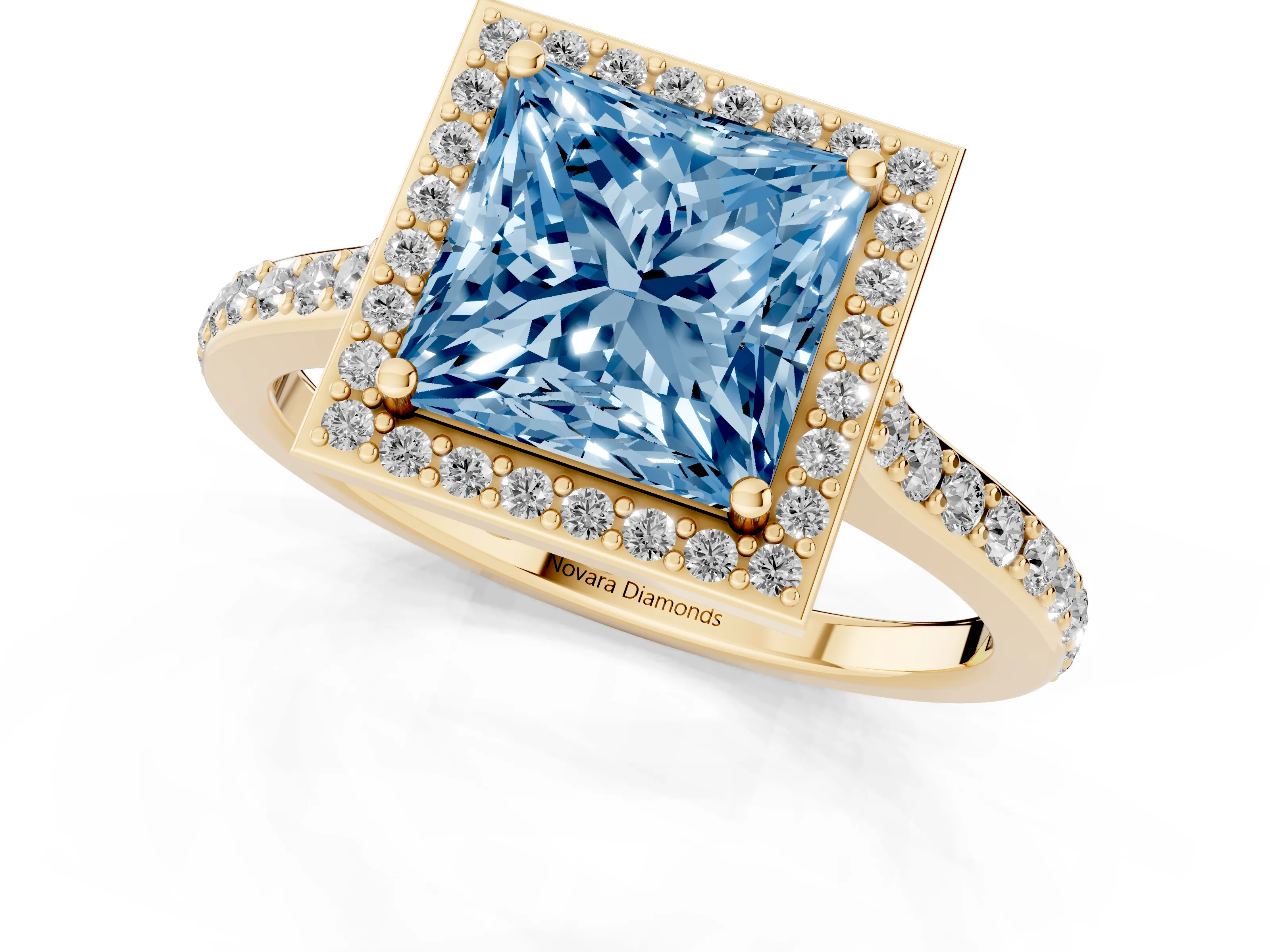 Fancy Blue Princess Cut Diamond Halo Engagement Ring Set in Yellow gold with Round Pavé Shoulders and Heart Gallery