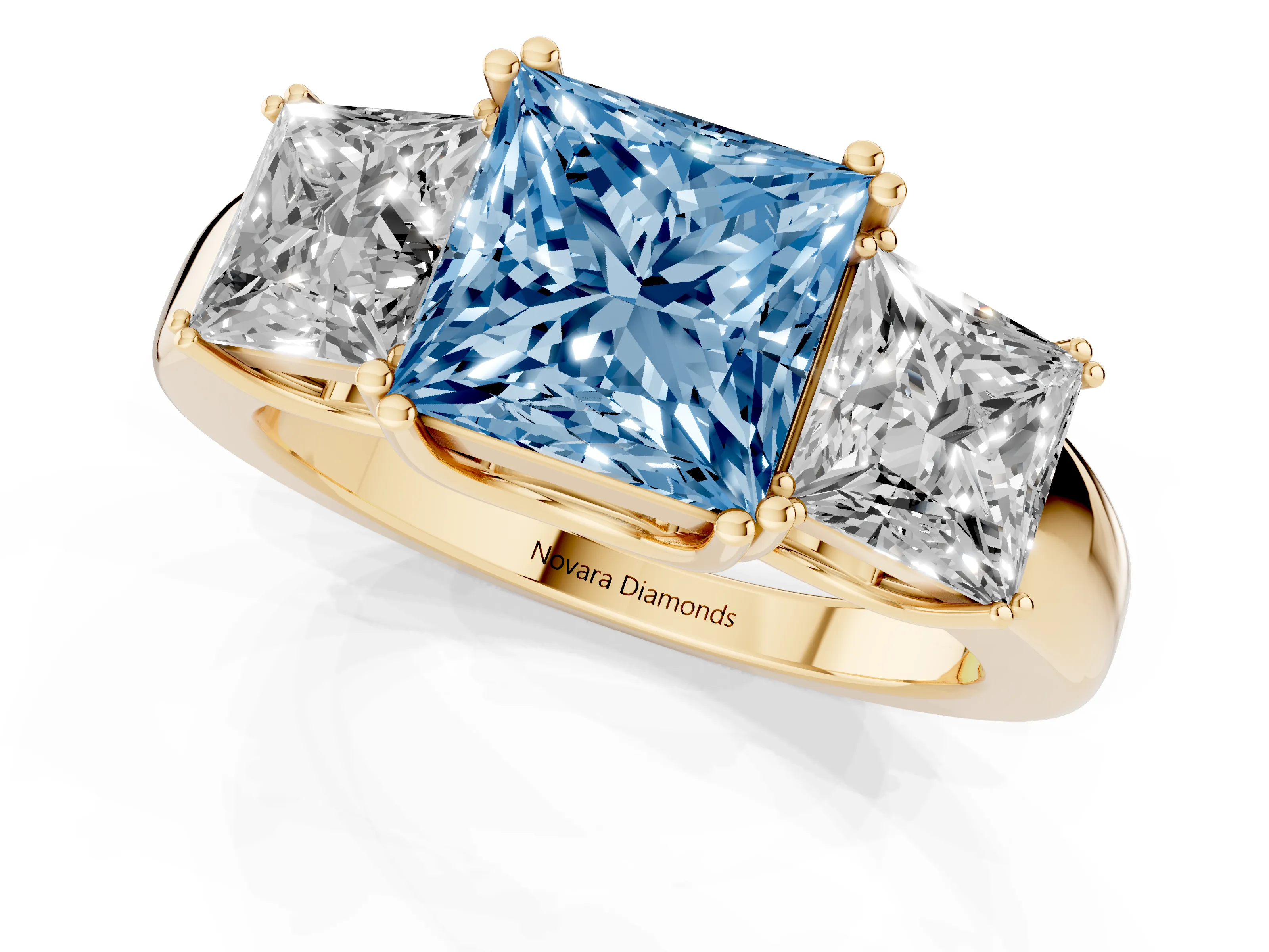 Fancy Blue Princess Cut Diamond Three-Stone Ring Set in Yellow gold with Polished Channel-Set Band