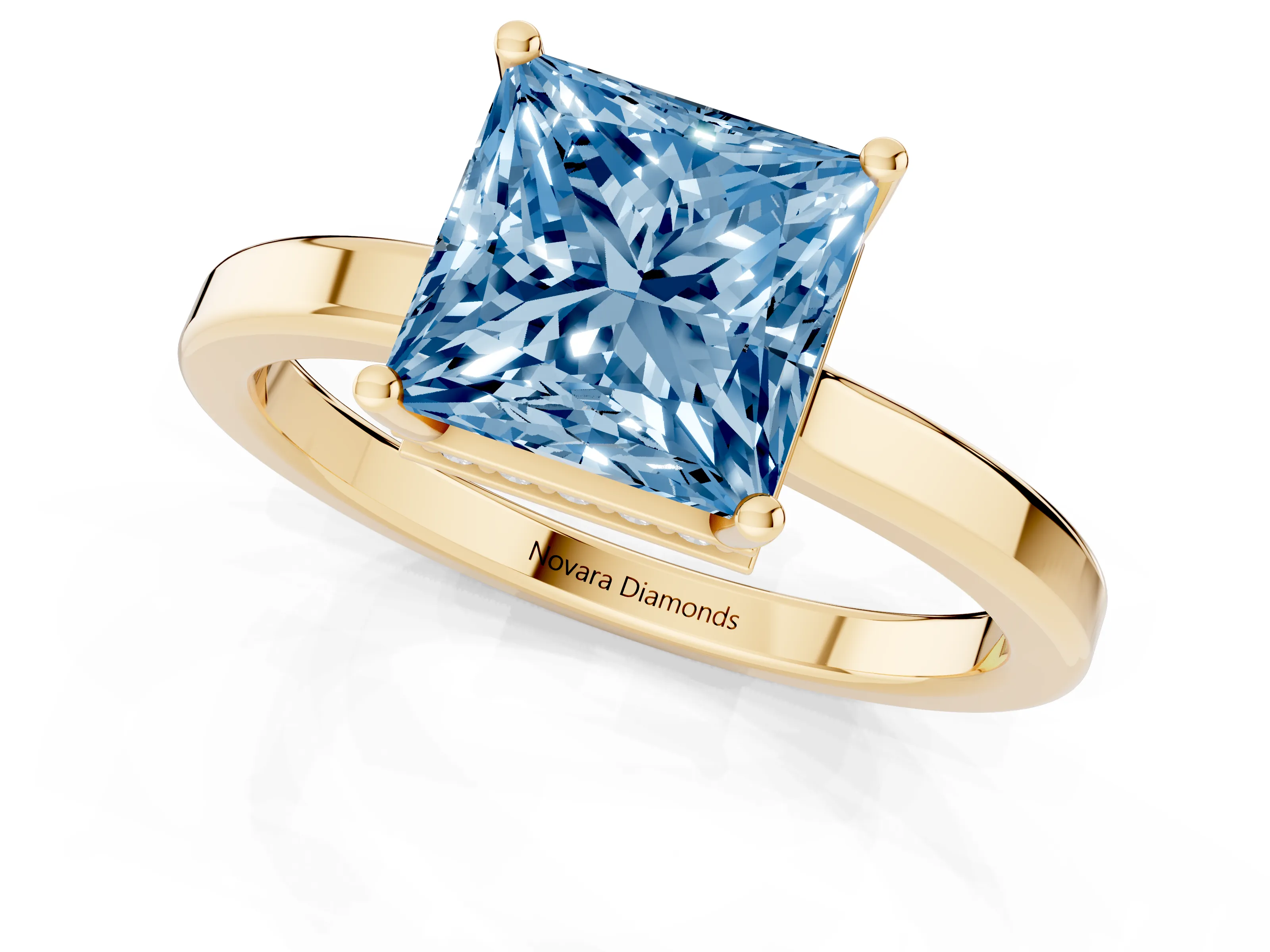 Fancy Blue Princess Cut Diamond Solitaire Engagement Ring Set in Yellow gold with Prong Setting on a Plain Band