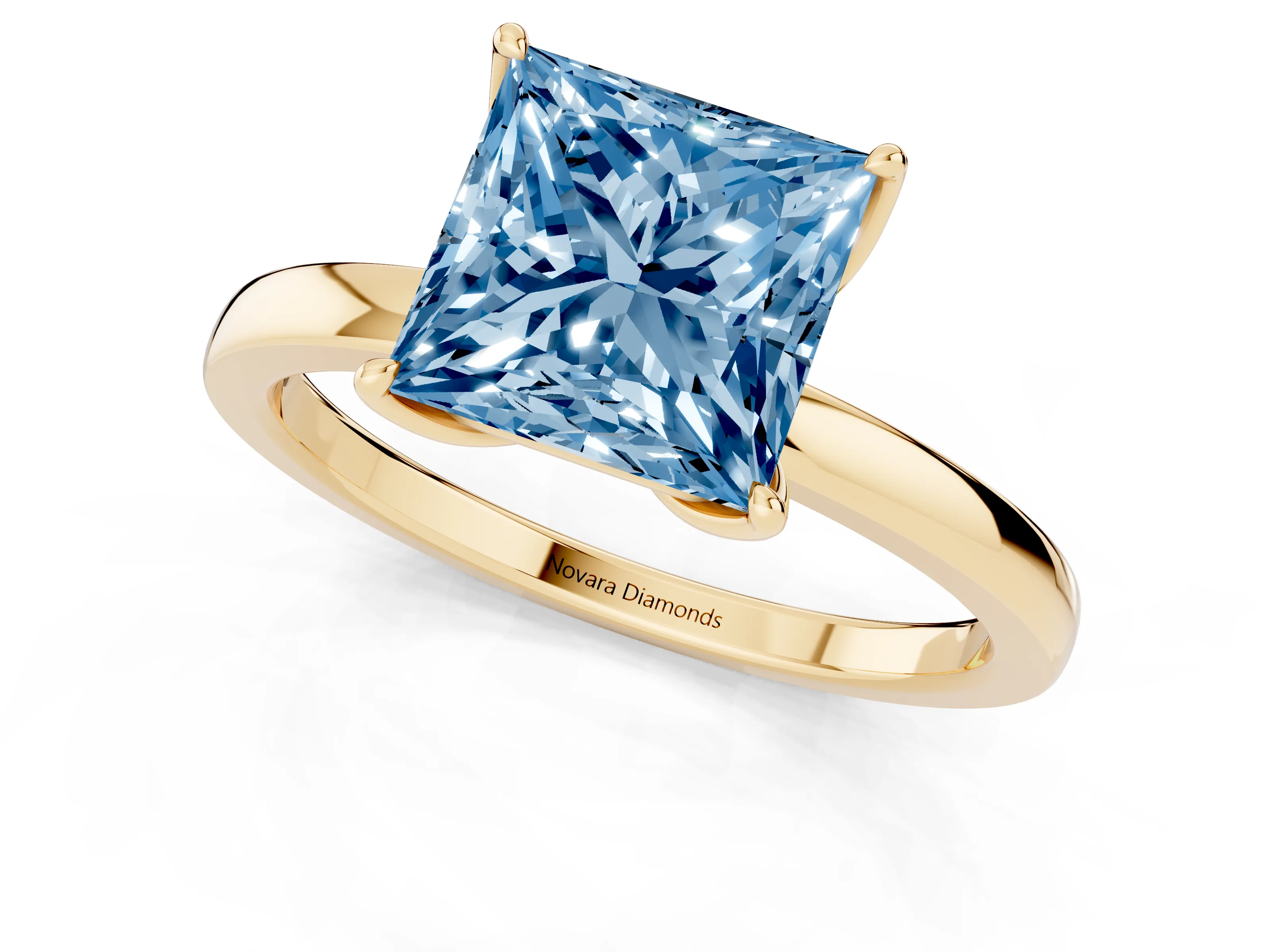 Fancy Blue Princess Cut Diamond Solitaire Ring Set in Yellow gold with Prong Setting and Thin Polished Band