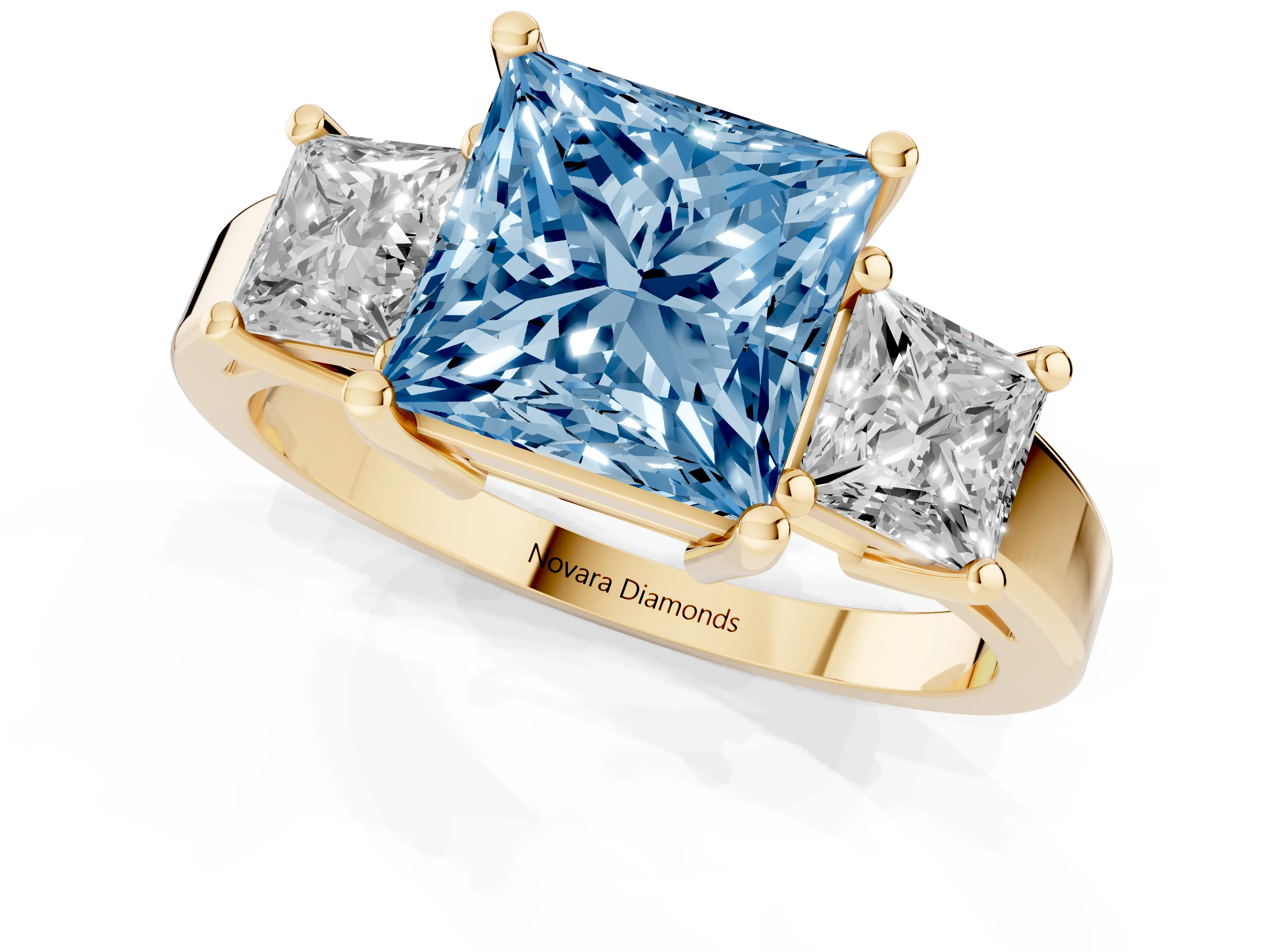 Fancy Blue Three-Stone Princess Cut Diamond Solitaire Ring Set in Yellow gold with Prong Setting