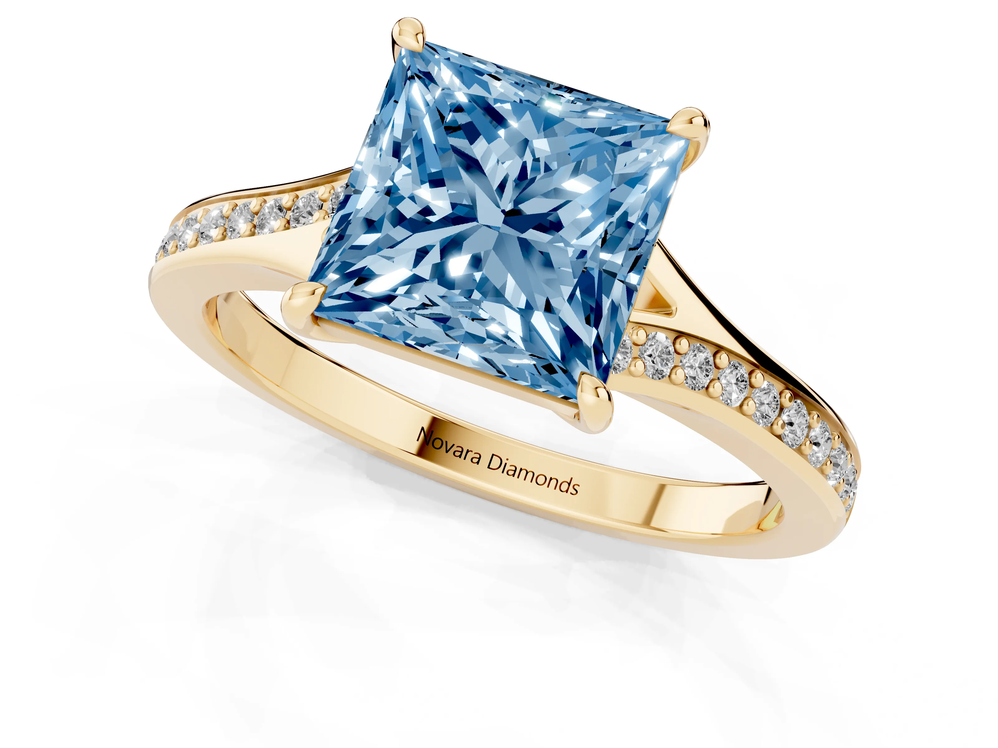 Fancy Blue Princess Cut Diamond Solitaire Ring Set in Yellow gold with Pavé Accent Band and Classic Prong Setting