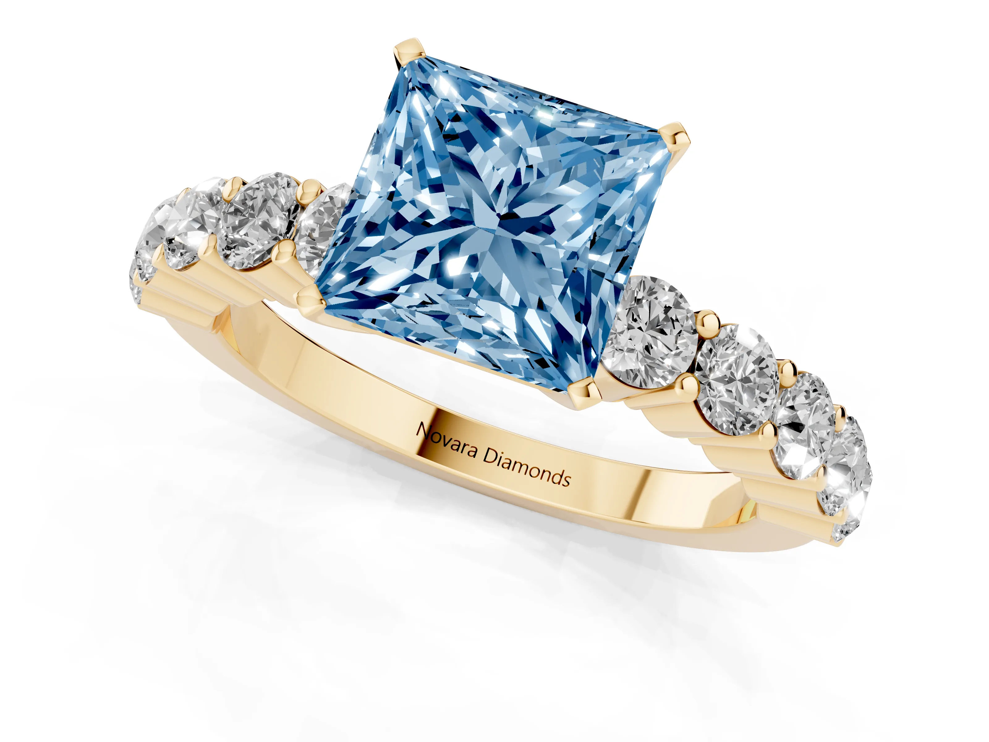 Fancy Blue Princess Cut Diamond Solitaire Ring Set in Yellow gold with Shared Prong Round Side Stones