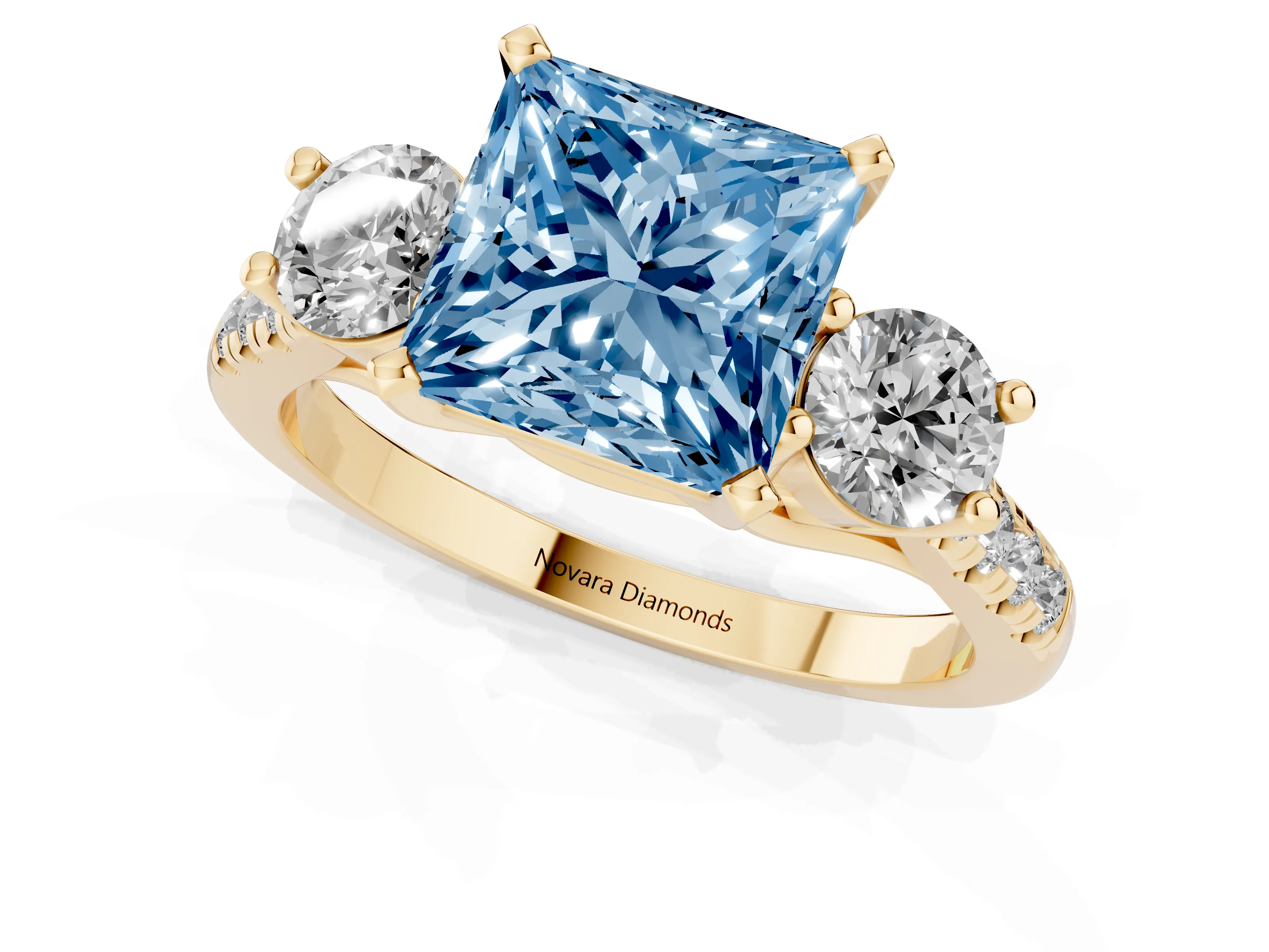 Fancy Blue Three-Stone Princess Cut Diamond Pavé Band Ring Set in Yellow gold with Prong-Set Trio