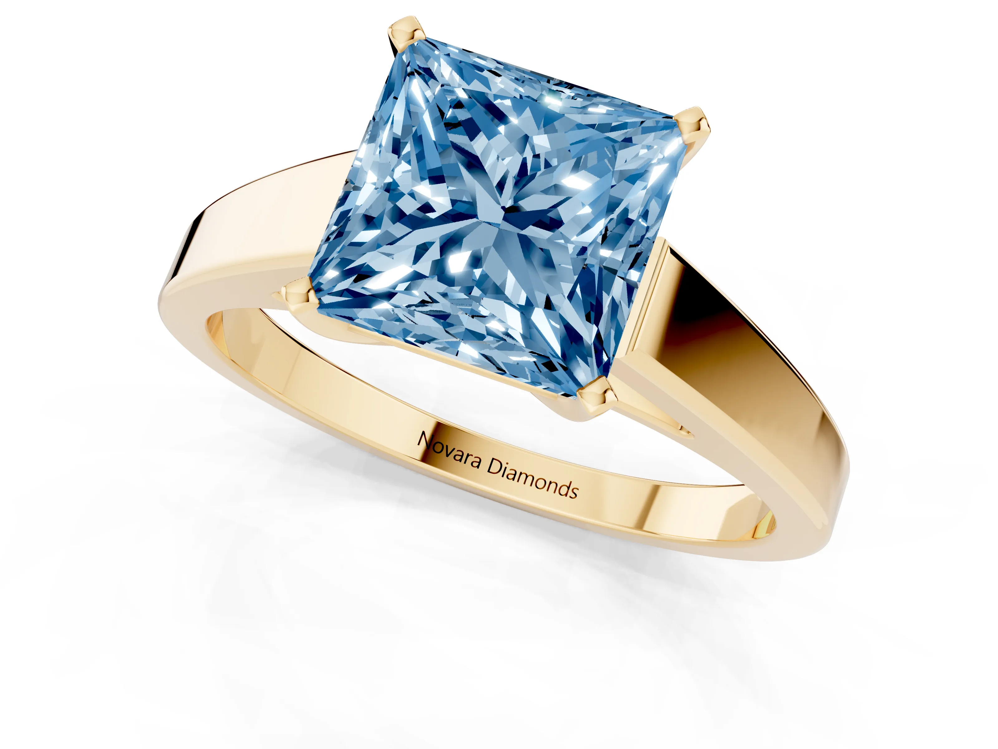 Fancy Blue Princess Cut Diamond Solitaire Engagement Ring Set in Yellow gold with Prong Setting and Tapered Band