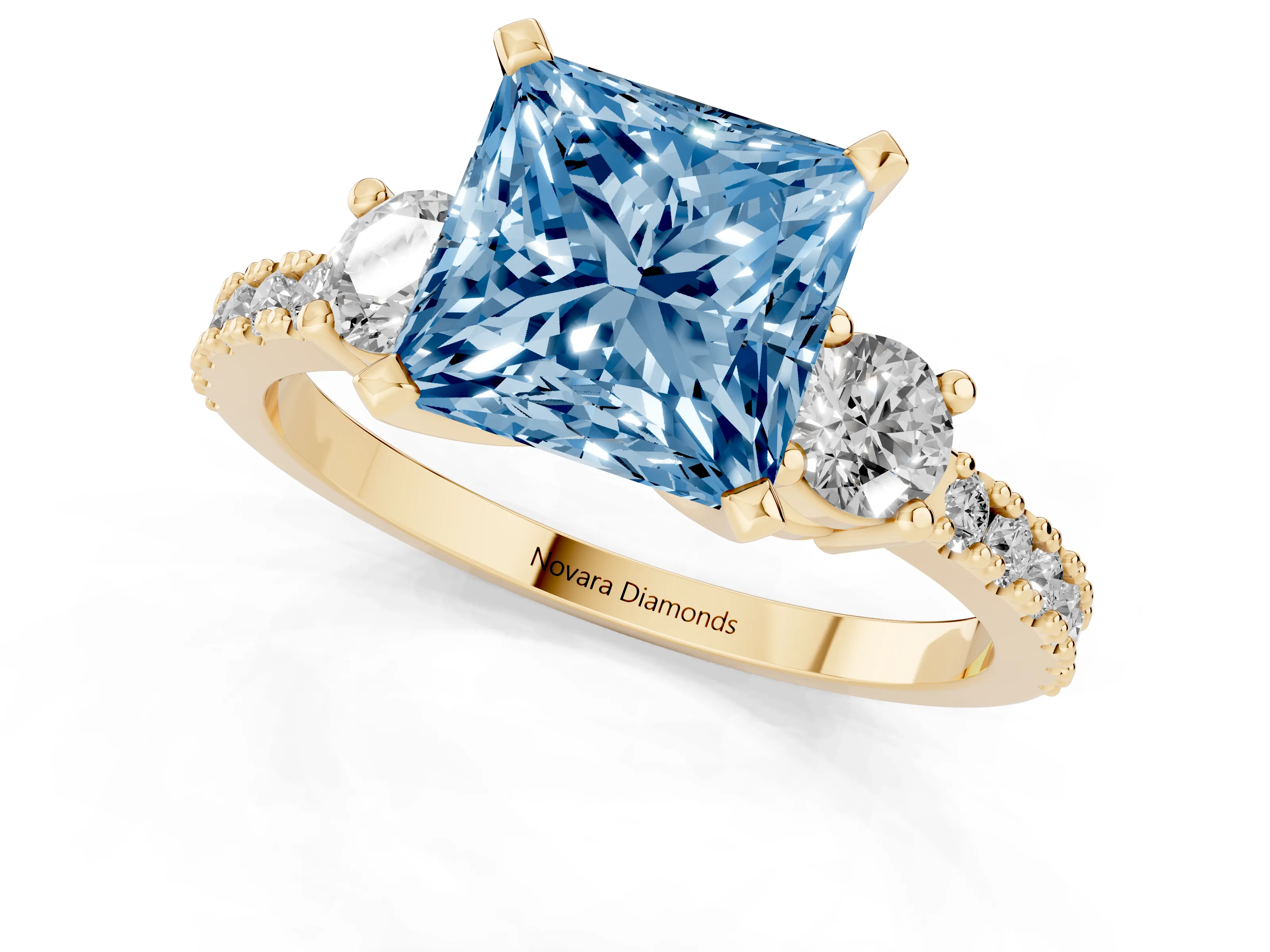 Fancy Blue Three-Stone Princess Cut Diamond Pavé Band Ring Set in Yellow gold with Prong Setting