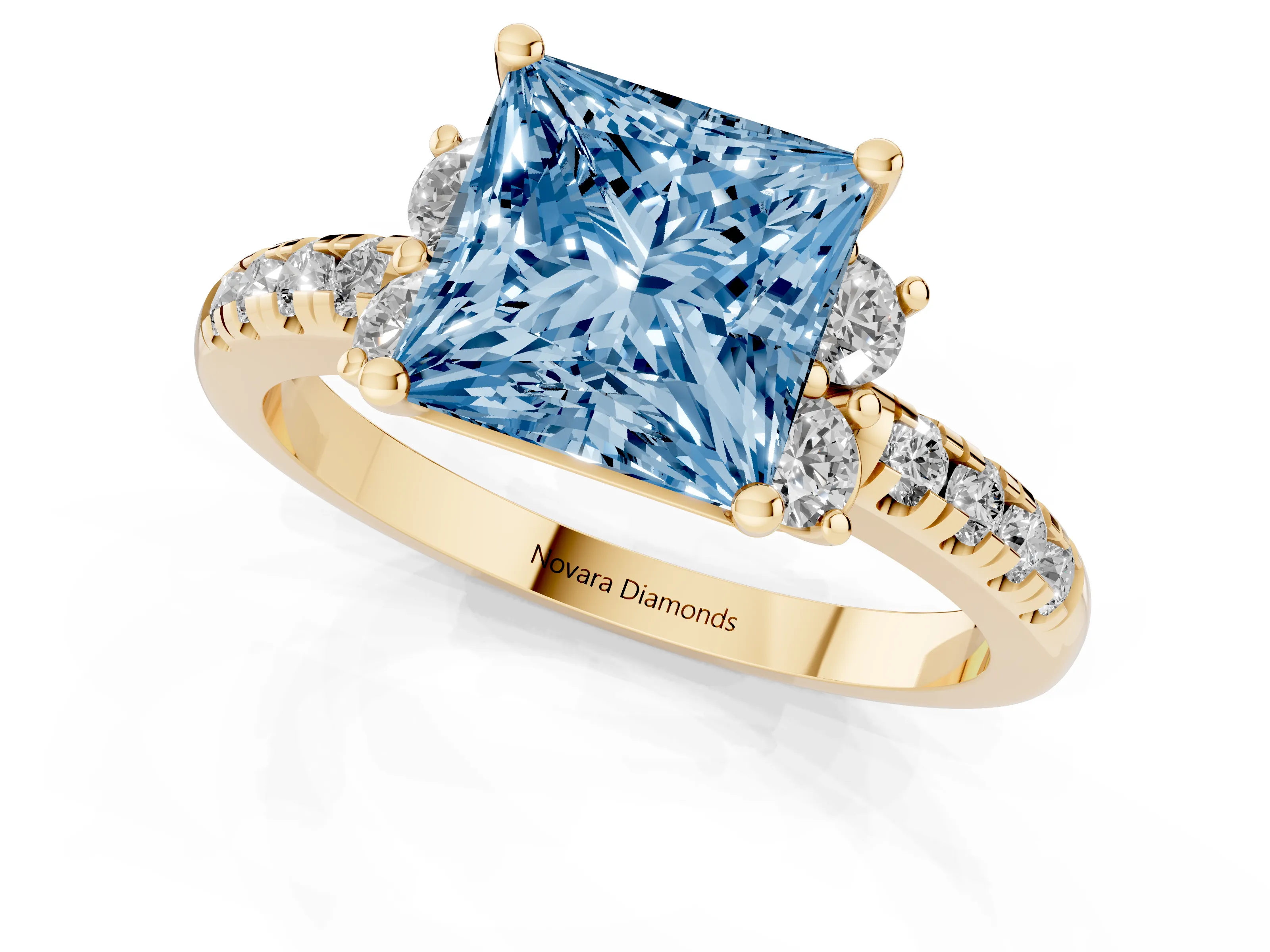 Fancy Blue Princess Cut Diamond Three-Stone Pavé Ring Set in Yellow gold with Prong Setting