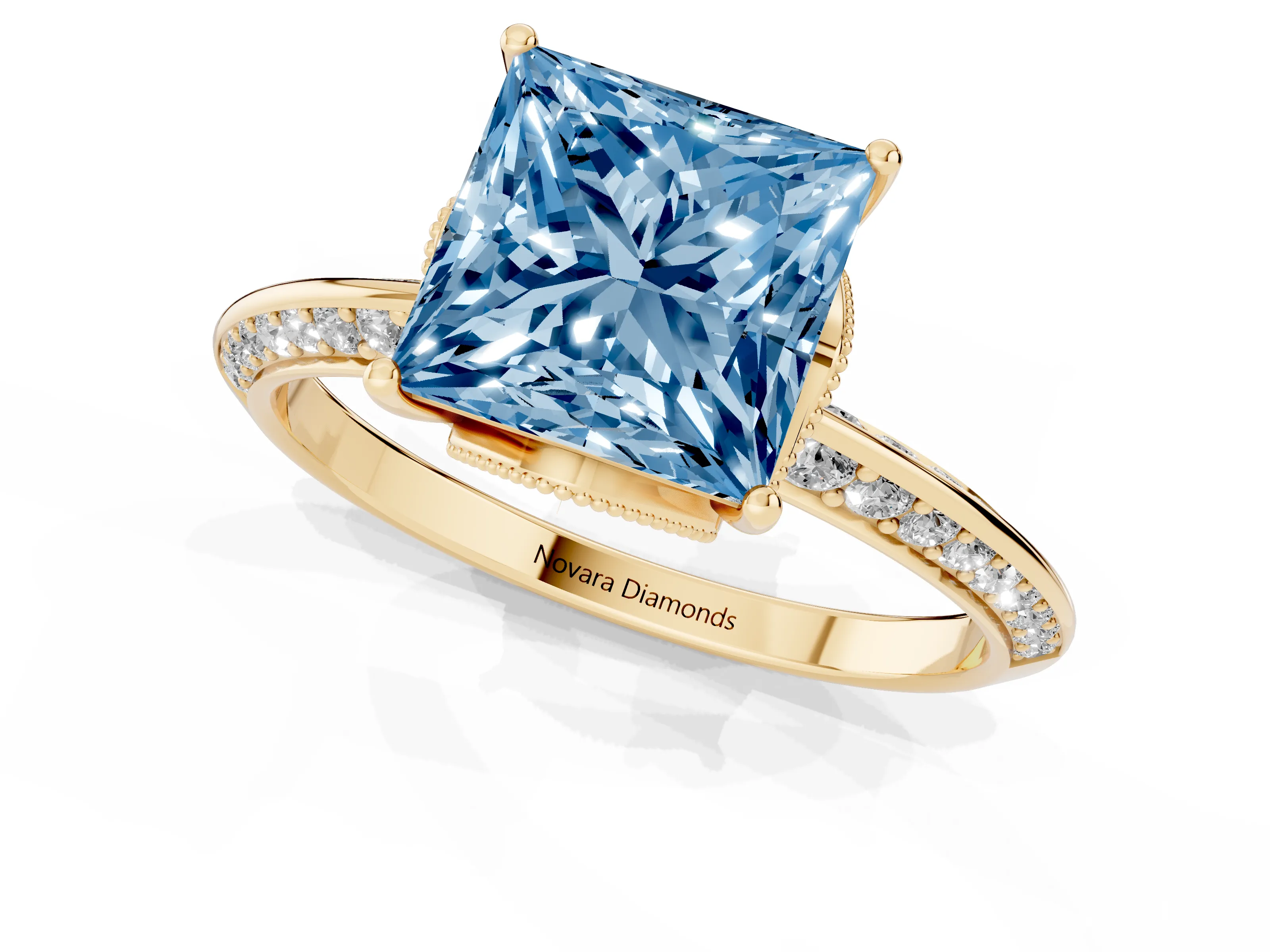 Fancy Blue Princess Cut Diamond Solitaire Engagement Ring Set in Yellow gold with Pavé Split Shank and Prong Setting