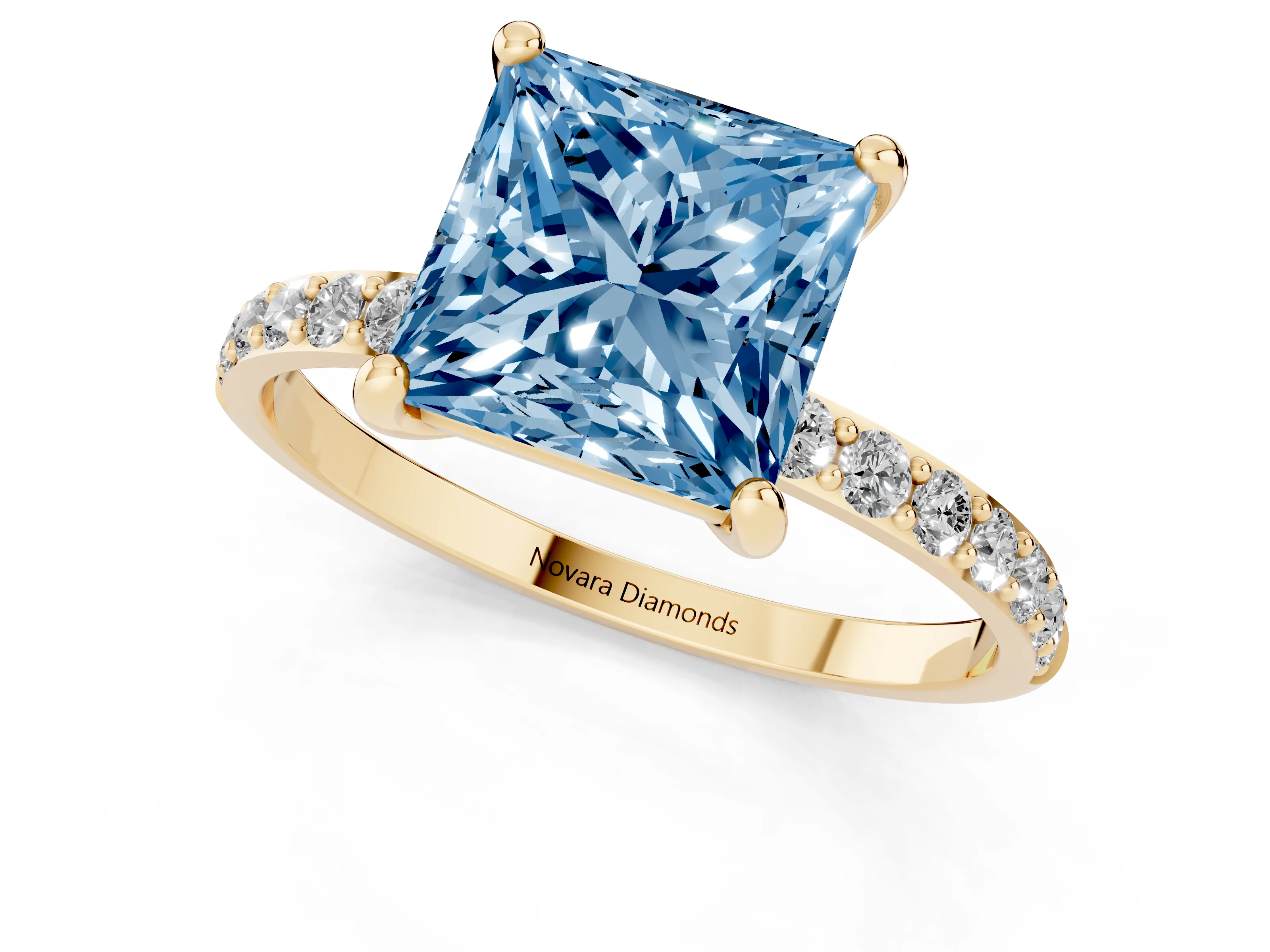 Fancy Blue Princess Cut Diamond Solitaire Ring Set in Yellow gold with Round Pavé Band and Prong Setting