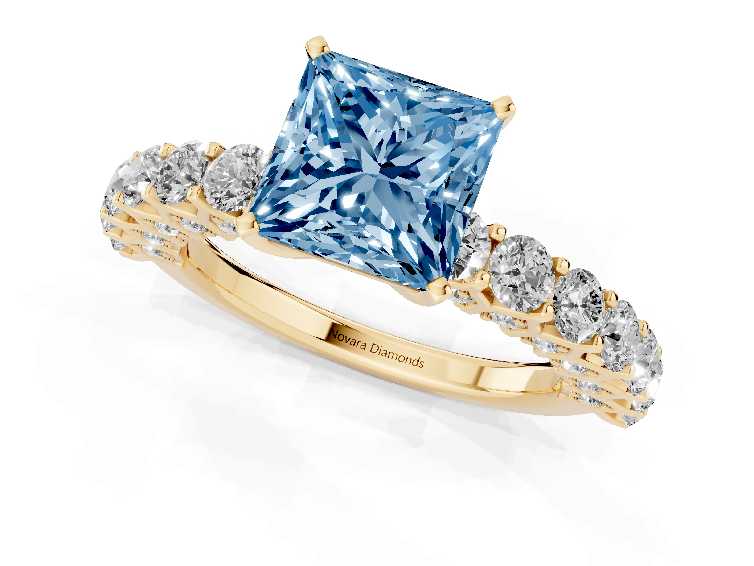 Fancy Blue Princess Cut Diamond Solitaire Ring Set in Yellow gold with Shared Prong Pavé Band