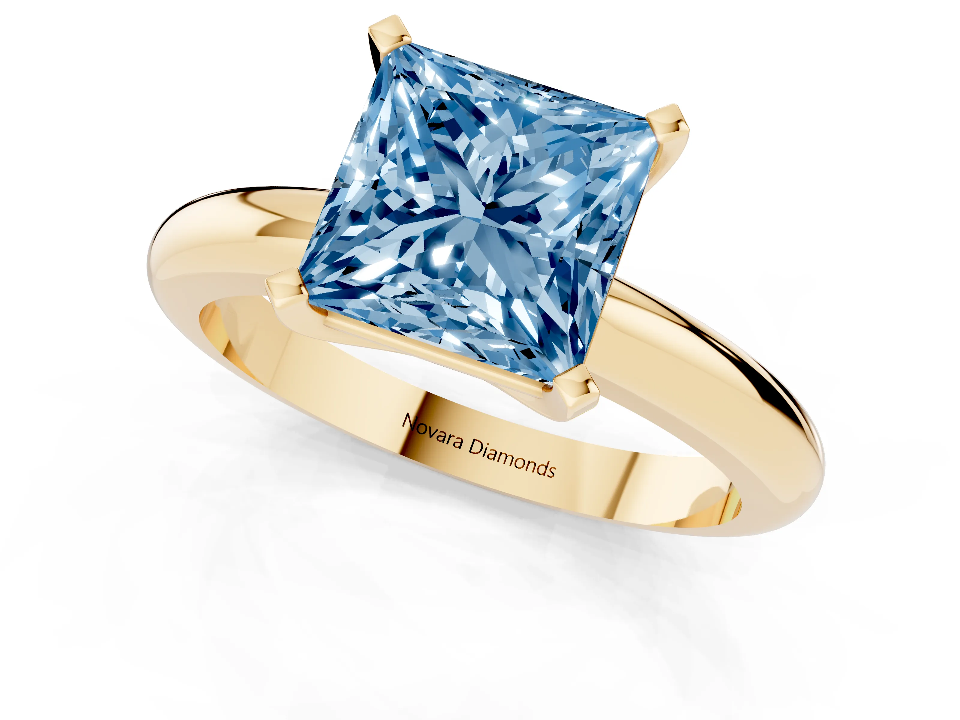 Fancy Blue Princess Cut Diamond Solitaire Engagement Ring Set in Yellow gold with Round Band and Prong Setting