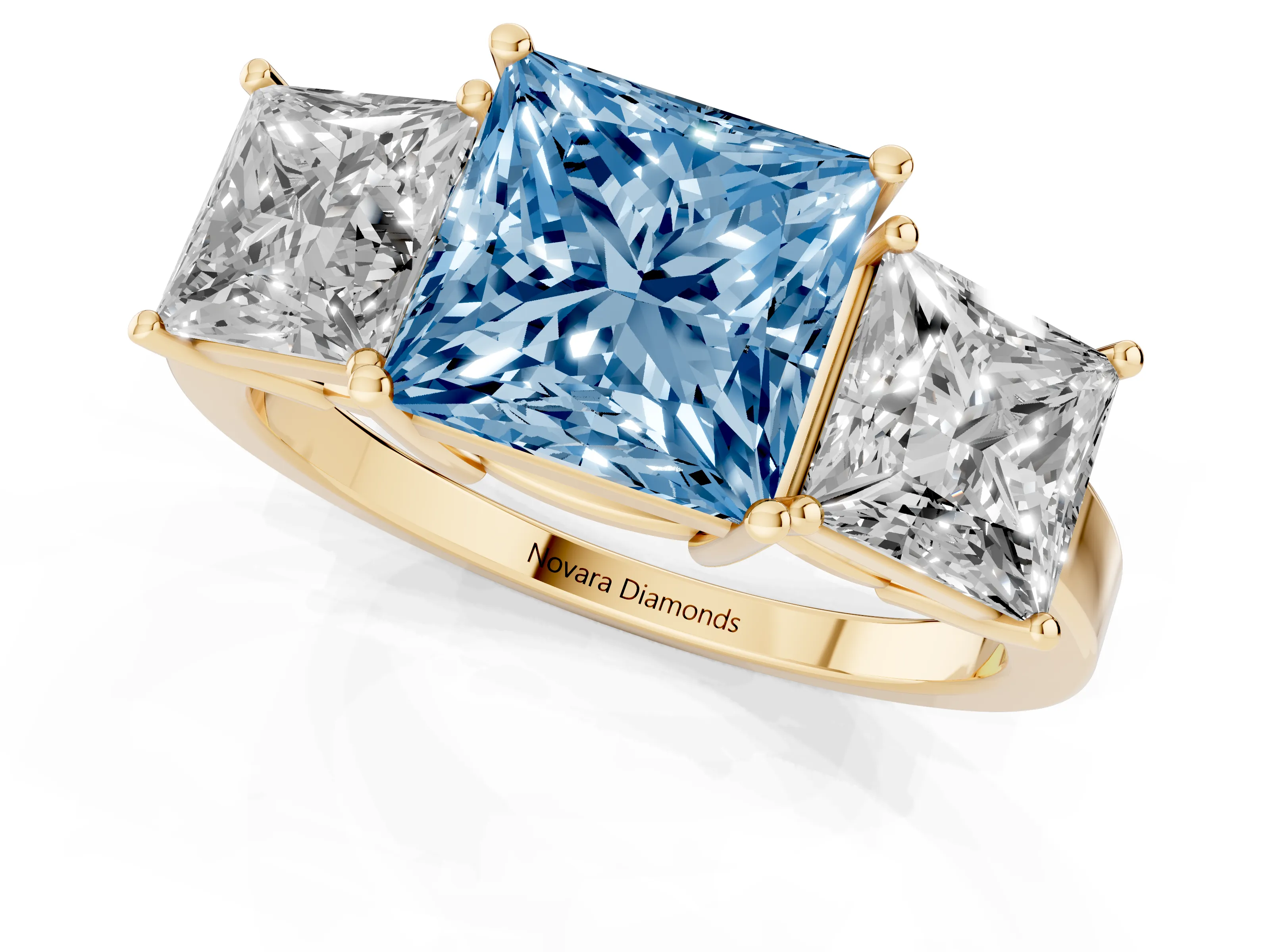 Fancy Blue Princess Cut Diamond Three-Stone Engagement Ring Set in Yellow gold with Flat Band