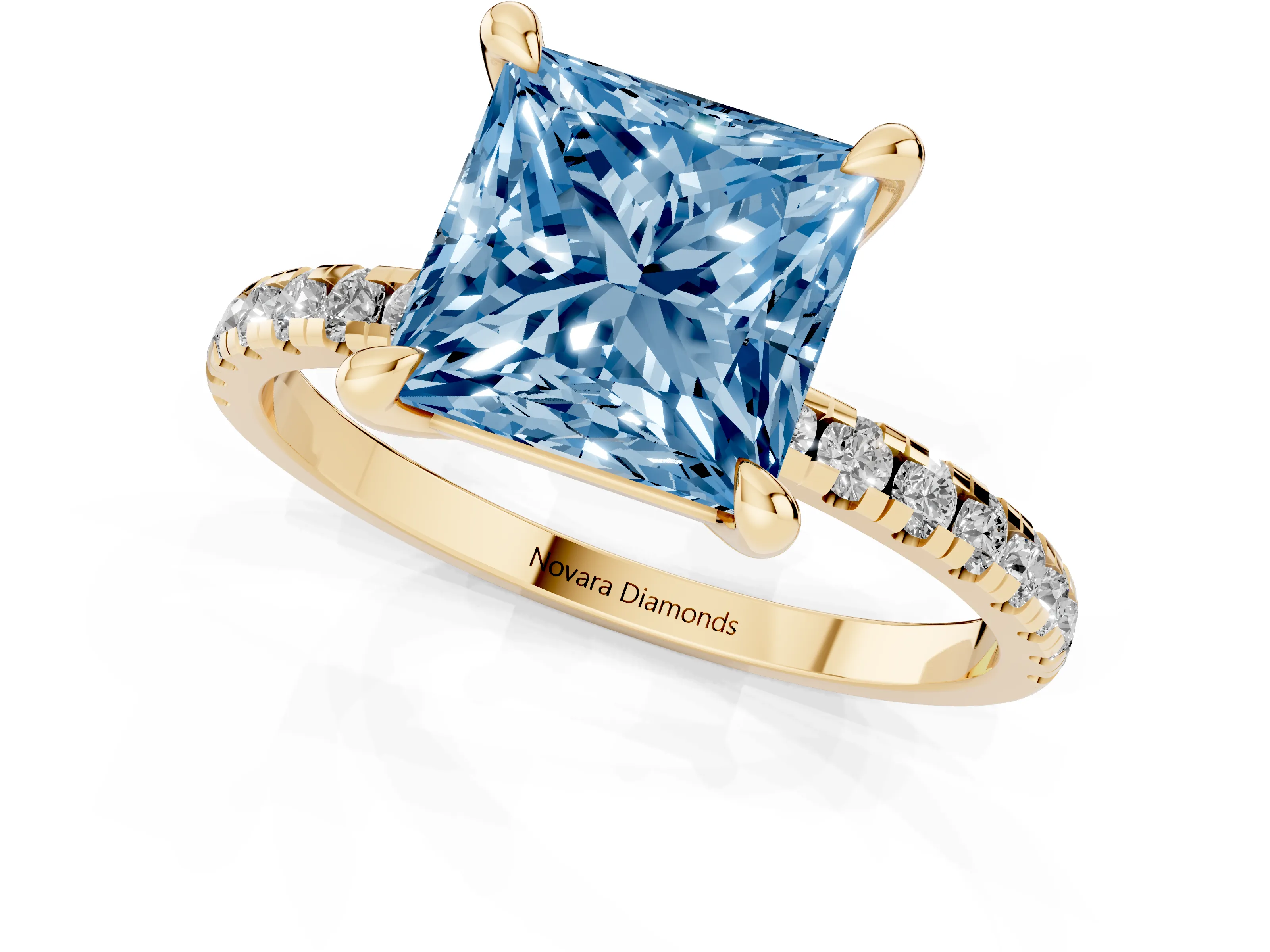 Fancy Blue Princess Cut Diamond Brilliant Solitaire Ring Set in Yellow gold with Pavé Band and Prong Setting