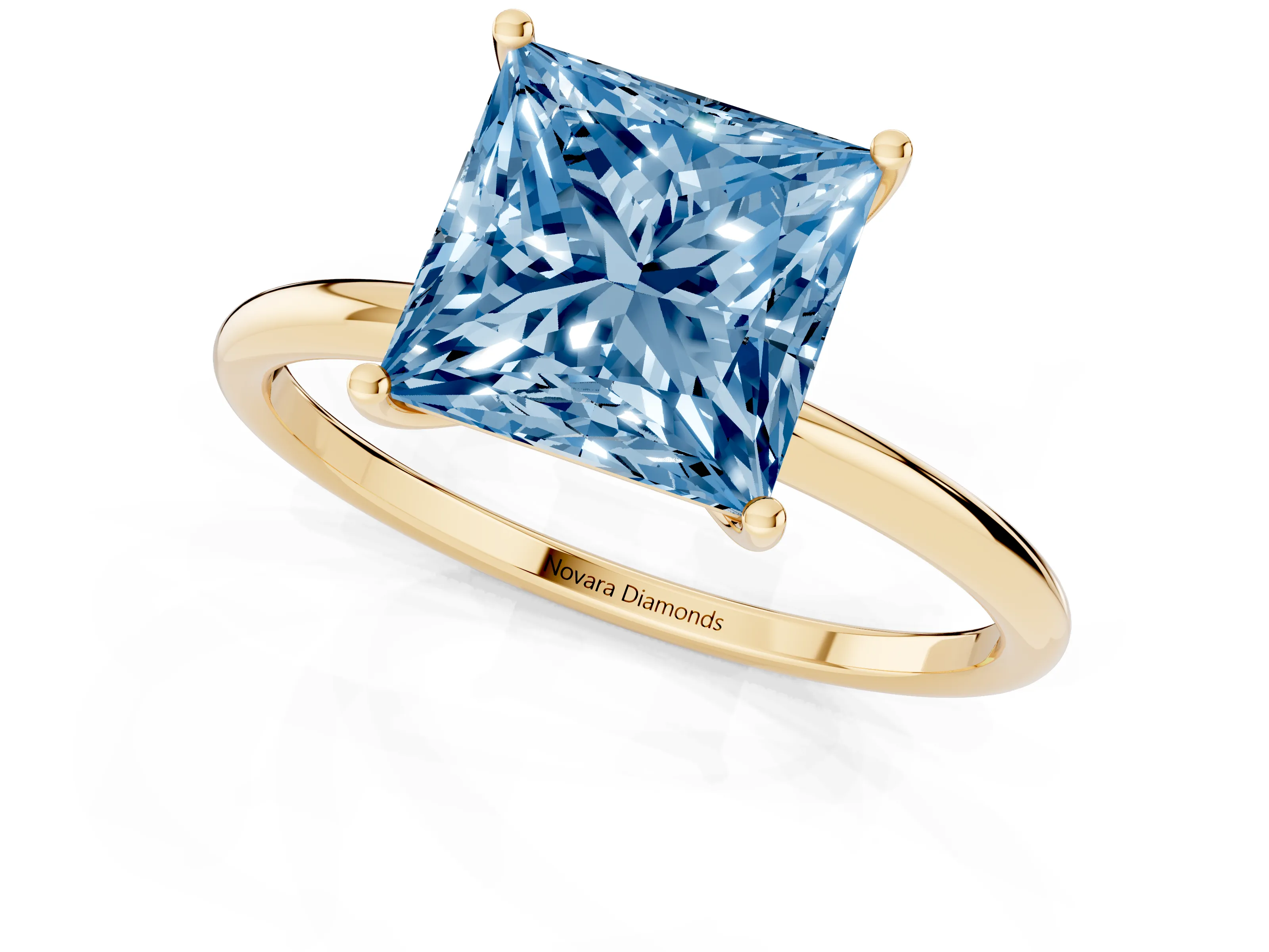 Fancy Blue Princess Cut Diamond Solitaire Engagement Ring Set in Yellow gold with Thin Band and Prong Setting