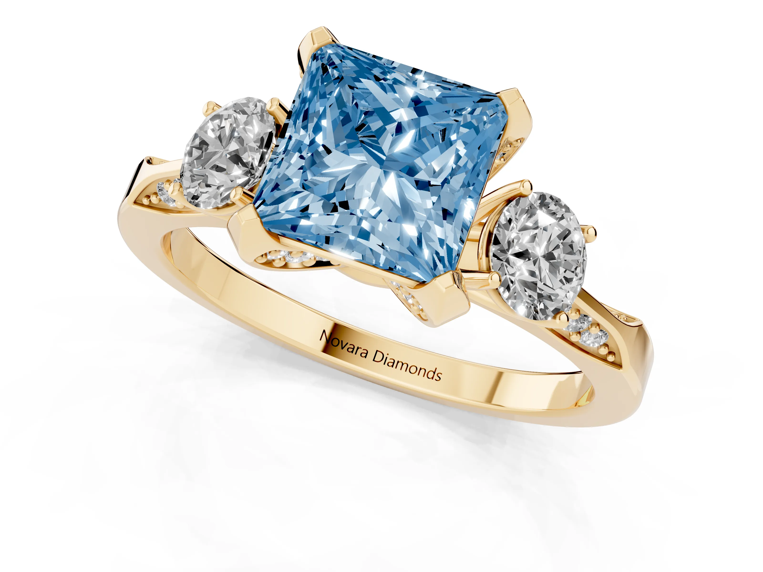 Fancy Blue Princess Cut Diamond Three-Stone Ring Set in Yellow gold with Pavé Band and Smaller Side Stones