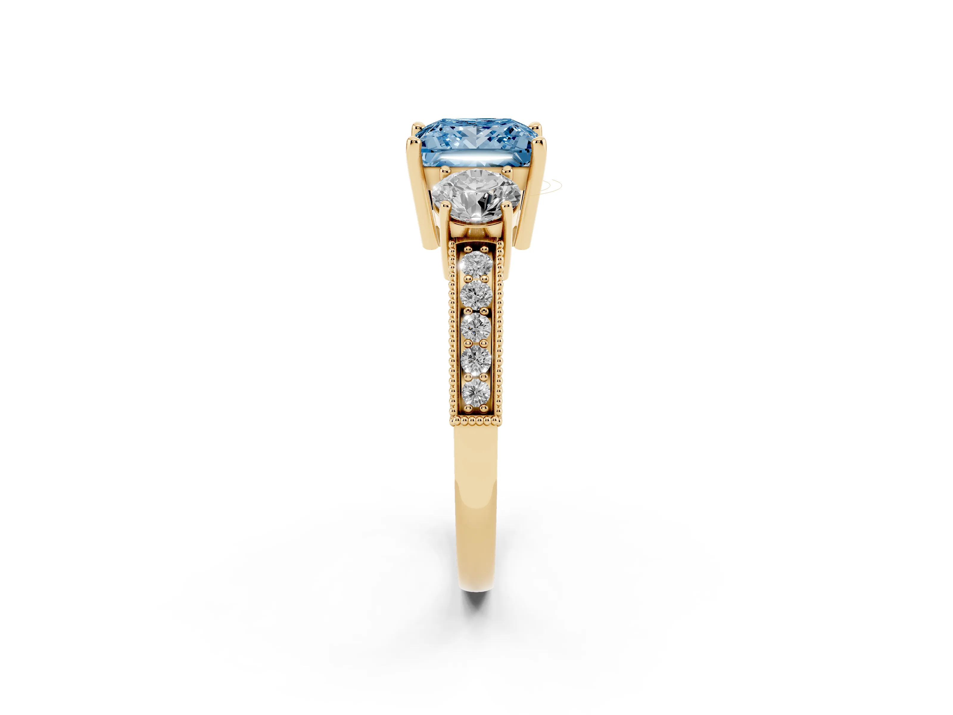 Fancy Blue Princess Cut Diamond Three-Stone Ring Set in Yellow gold with Round Side Stones and Pavé Band