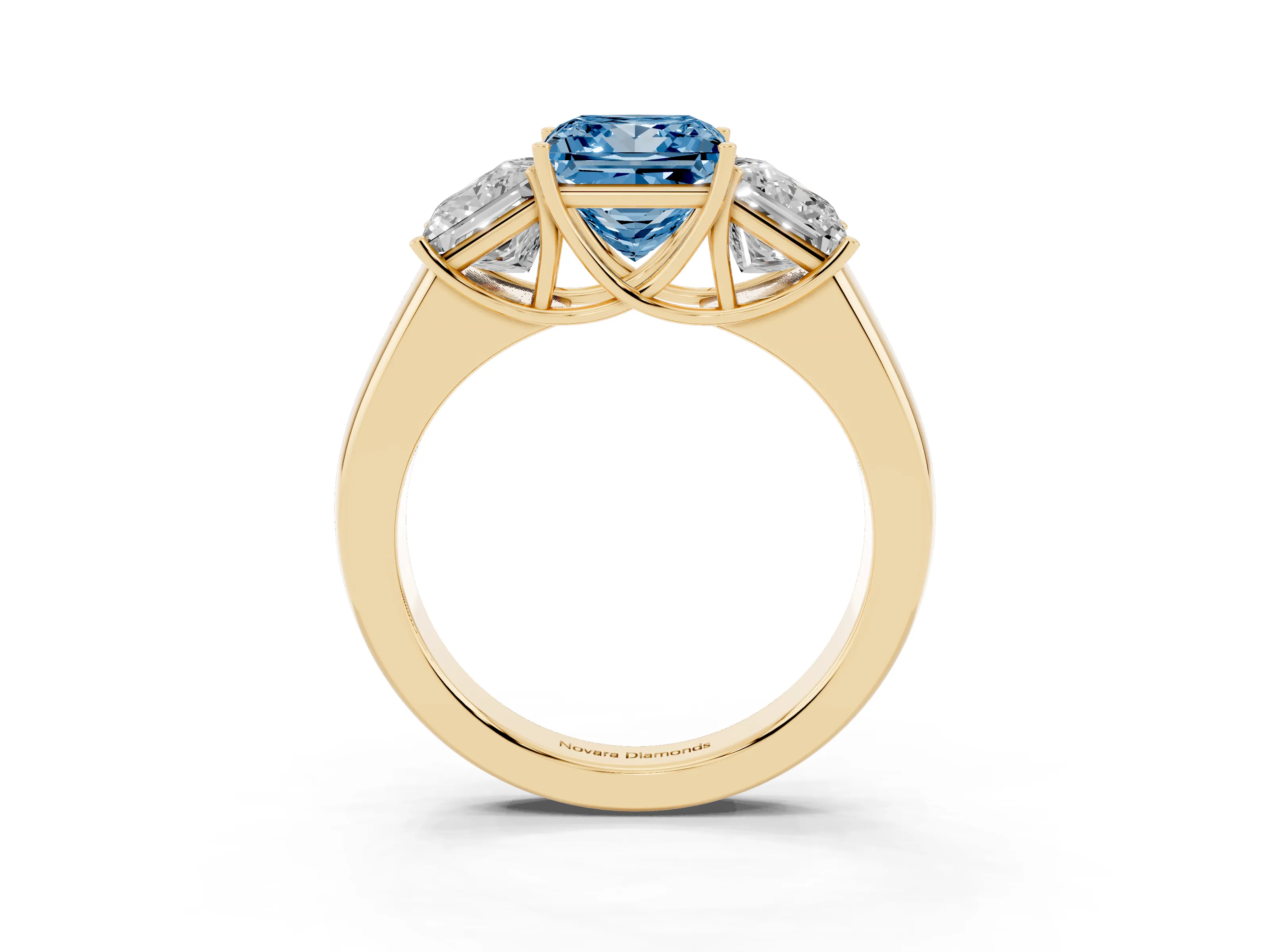 Fancy Blue Three-Stone Princess Cut Diamond Ring Set in Yellow gold with Matching Prong Settings and Plain Band