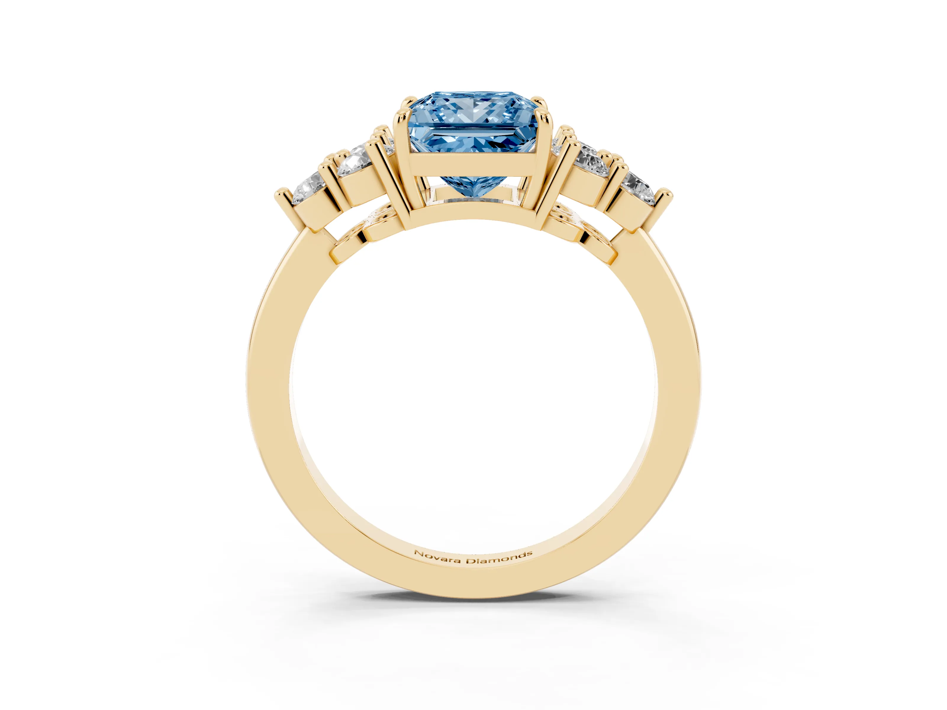 Fancy Blue Princess Cut Diamond Solitaire Ring Set in Yellow gold with Cluster Accents on Each Side