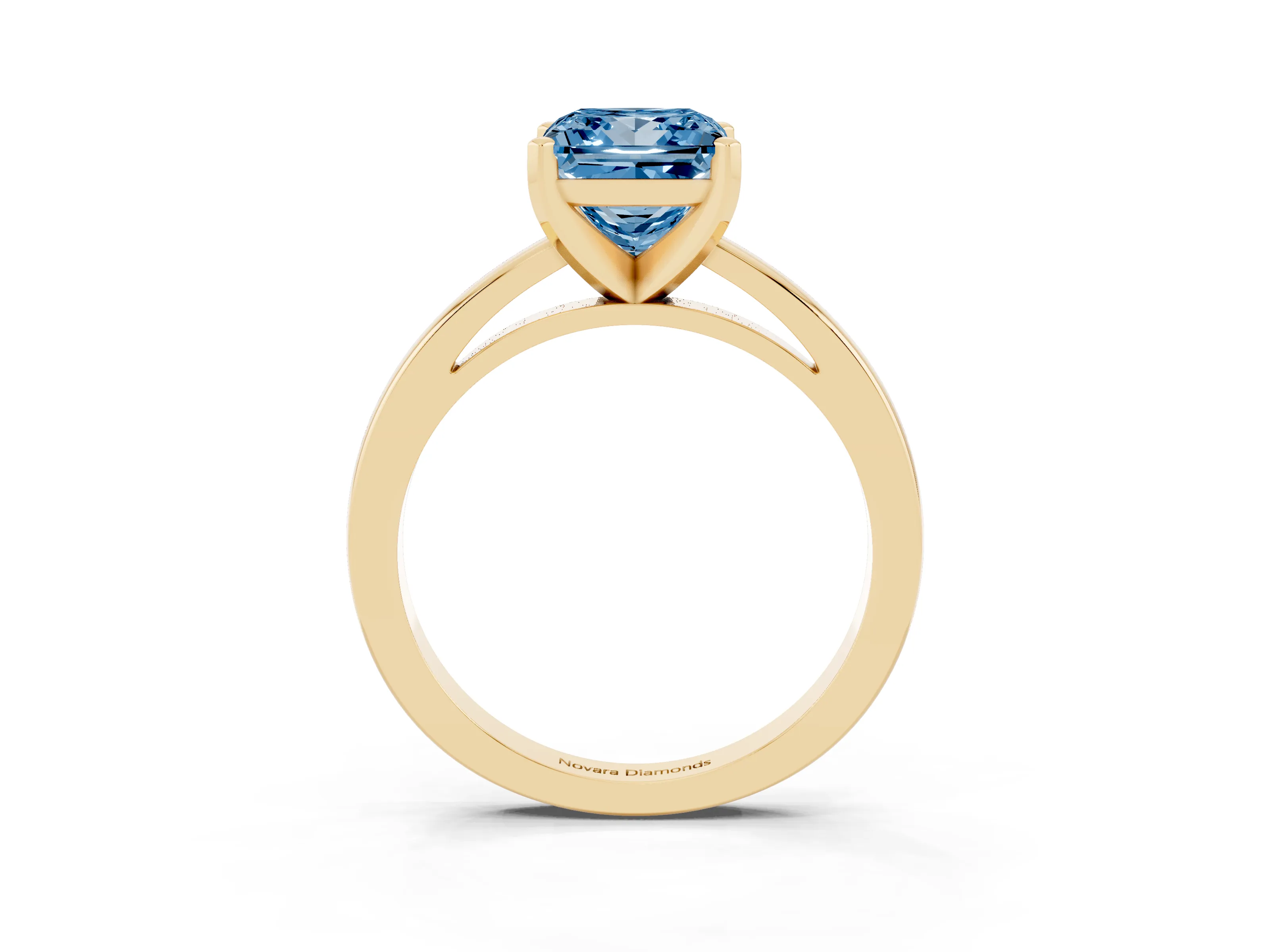 Fancy Blue Princess Cut Diamond Solitaire Engagement Ring Set in Yellow gold with Prong Setting on a Classic Band
