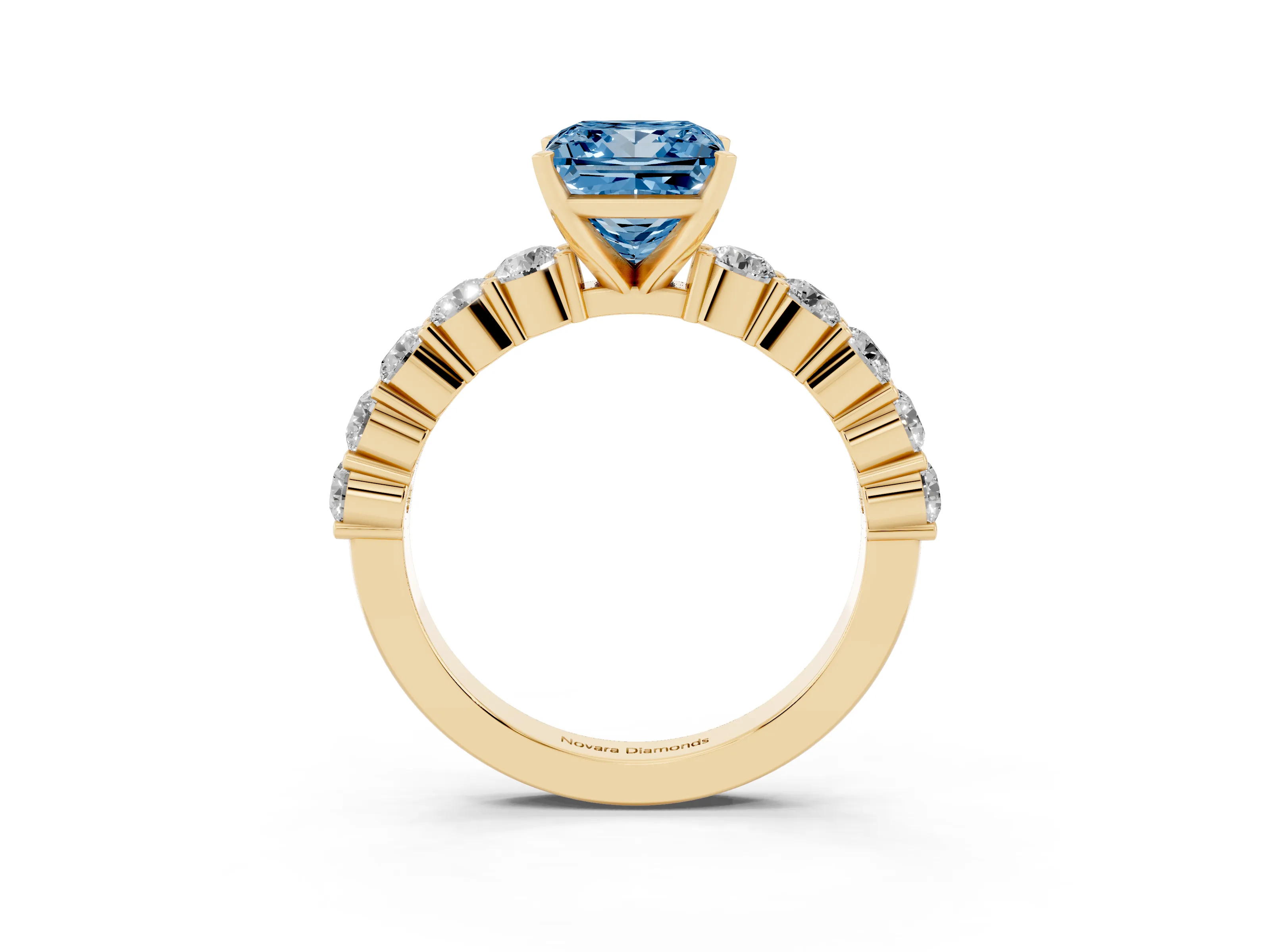 Fancy Blue Princess Cut Diamond Solitaire Ring Set in Yellow gold with Shared Prong Round Side Stones