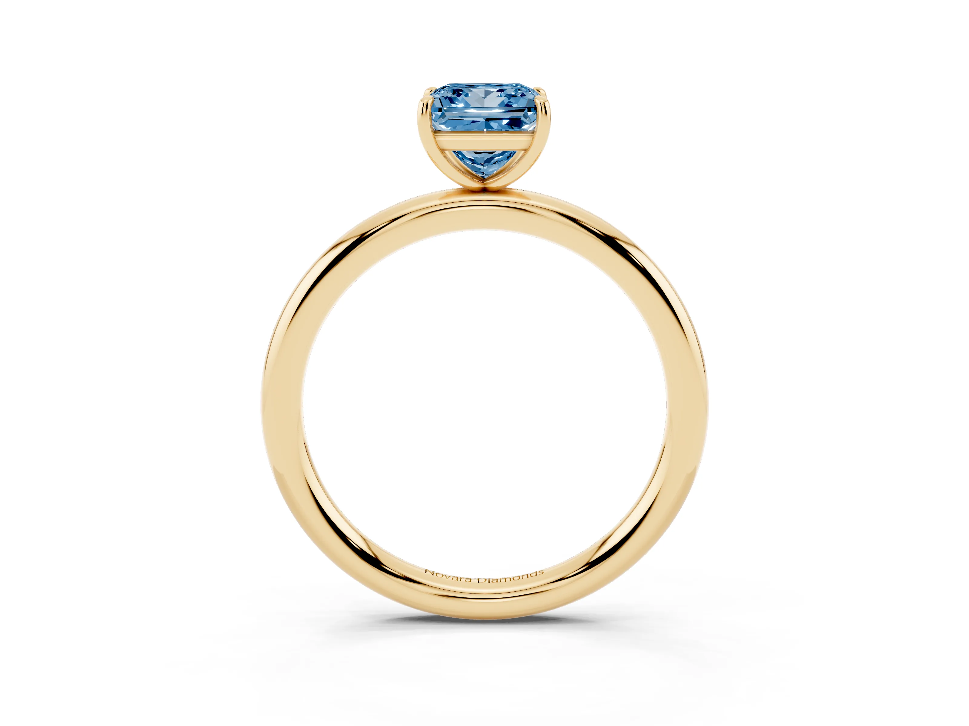 Fancy Blue Princess Cut Diamond Solitaire Ring Set in Yellow gold with Prong Setting on a Polished Plain Band