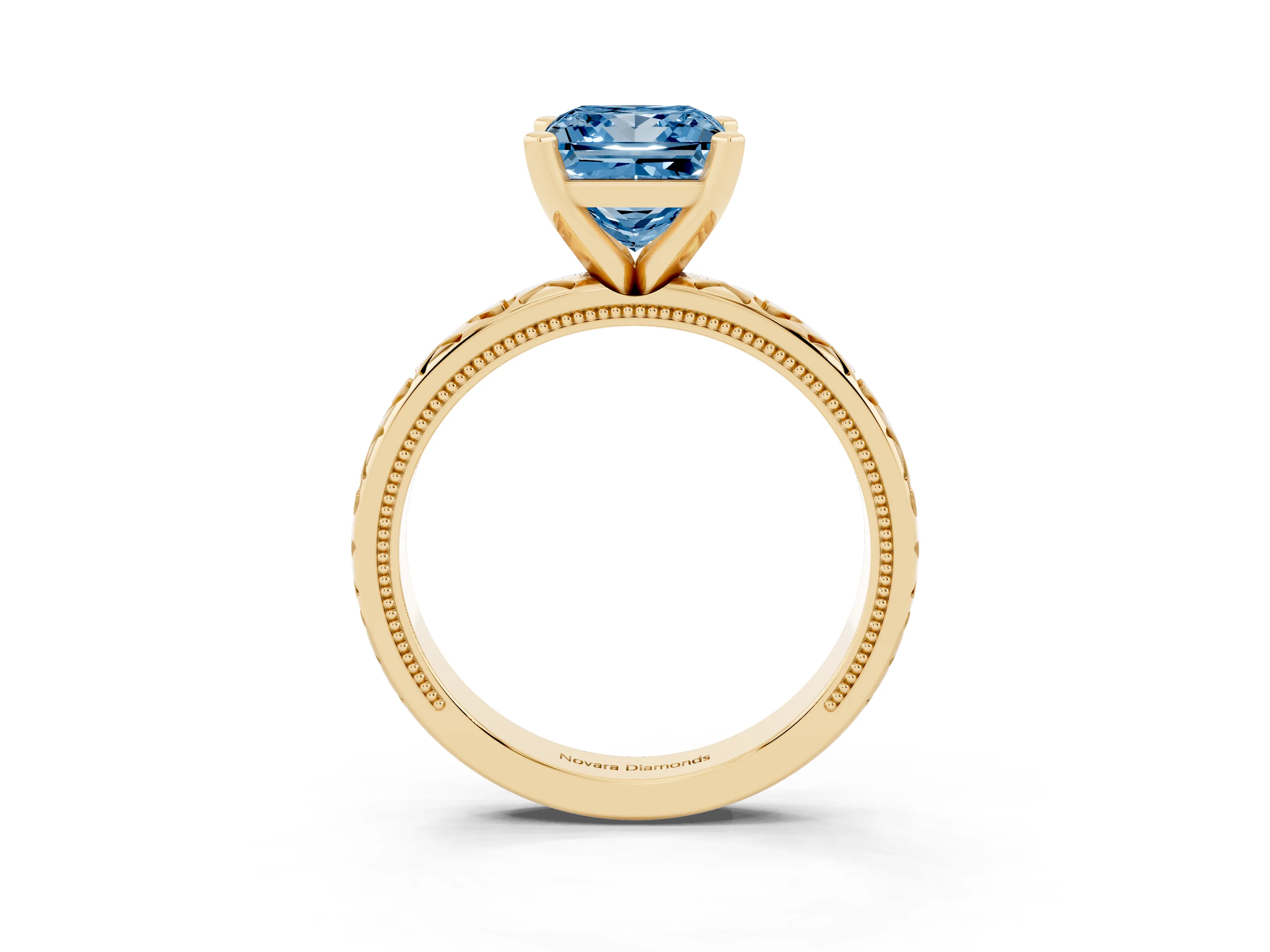 Fancy Blue Princess Cut Diamond Solitaire Engagement Ring Set in Yellow gold with XO Engraved Band and Prong Setting