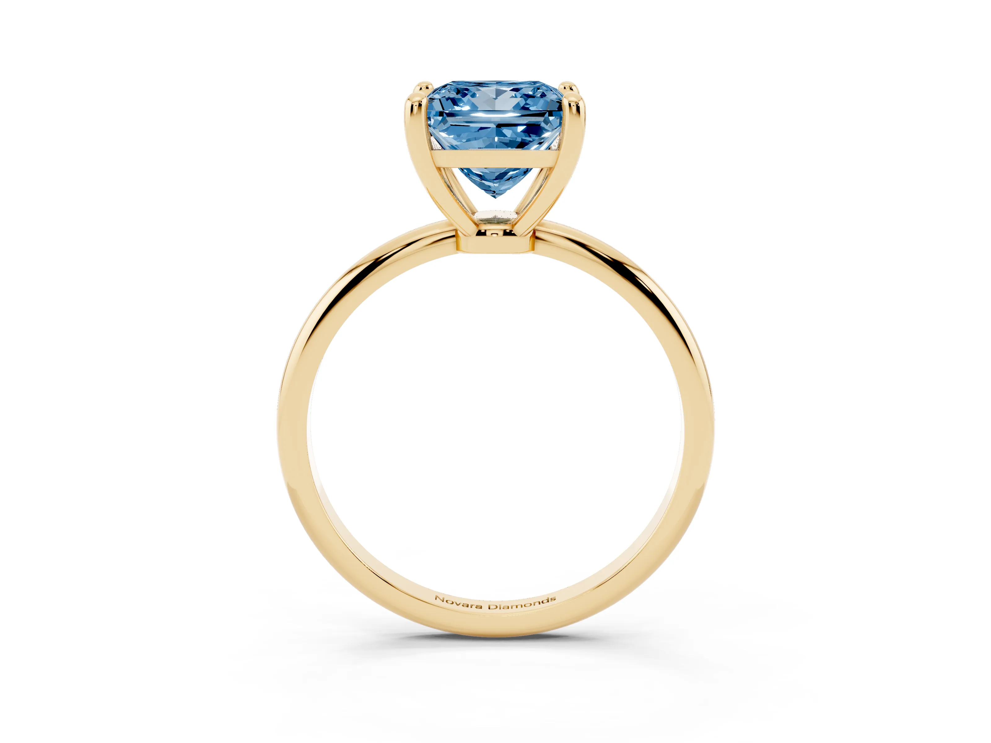 Fancy Blue Princess Cut Diamond Solitaire Ring Set in Yellow gold with Secure Prong Setting on a Classic Band