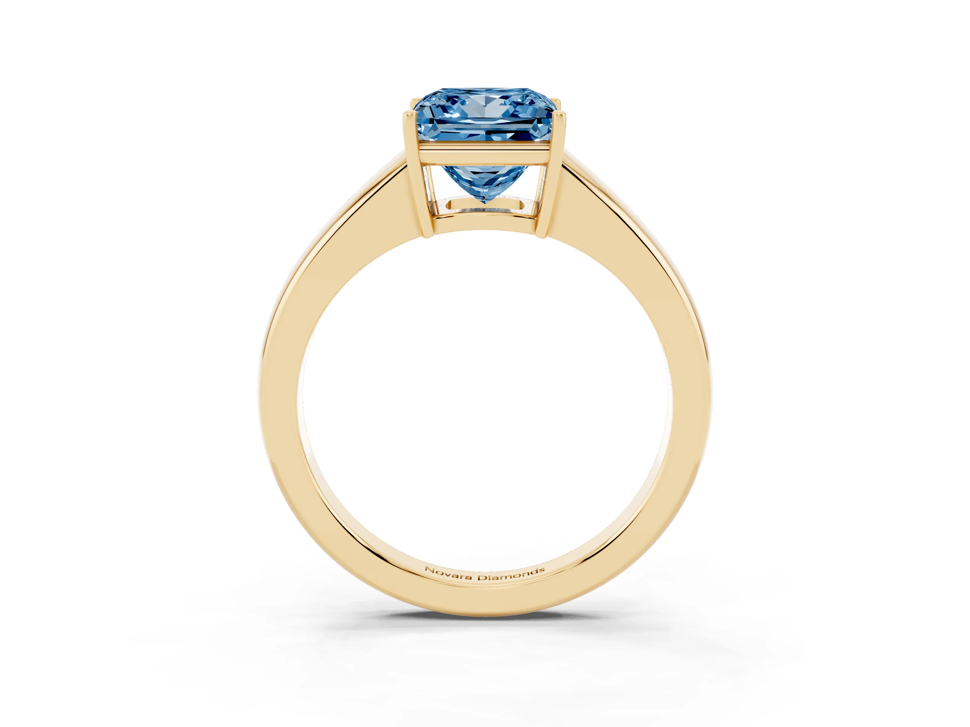 Fancy Blue Princess Cut Diamond Solitaire Ring Set in Yellow gold with Tapered Band and Prong Setting