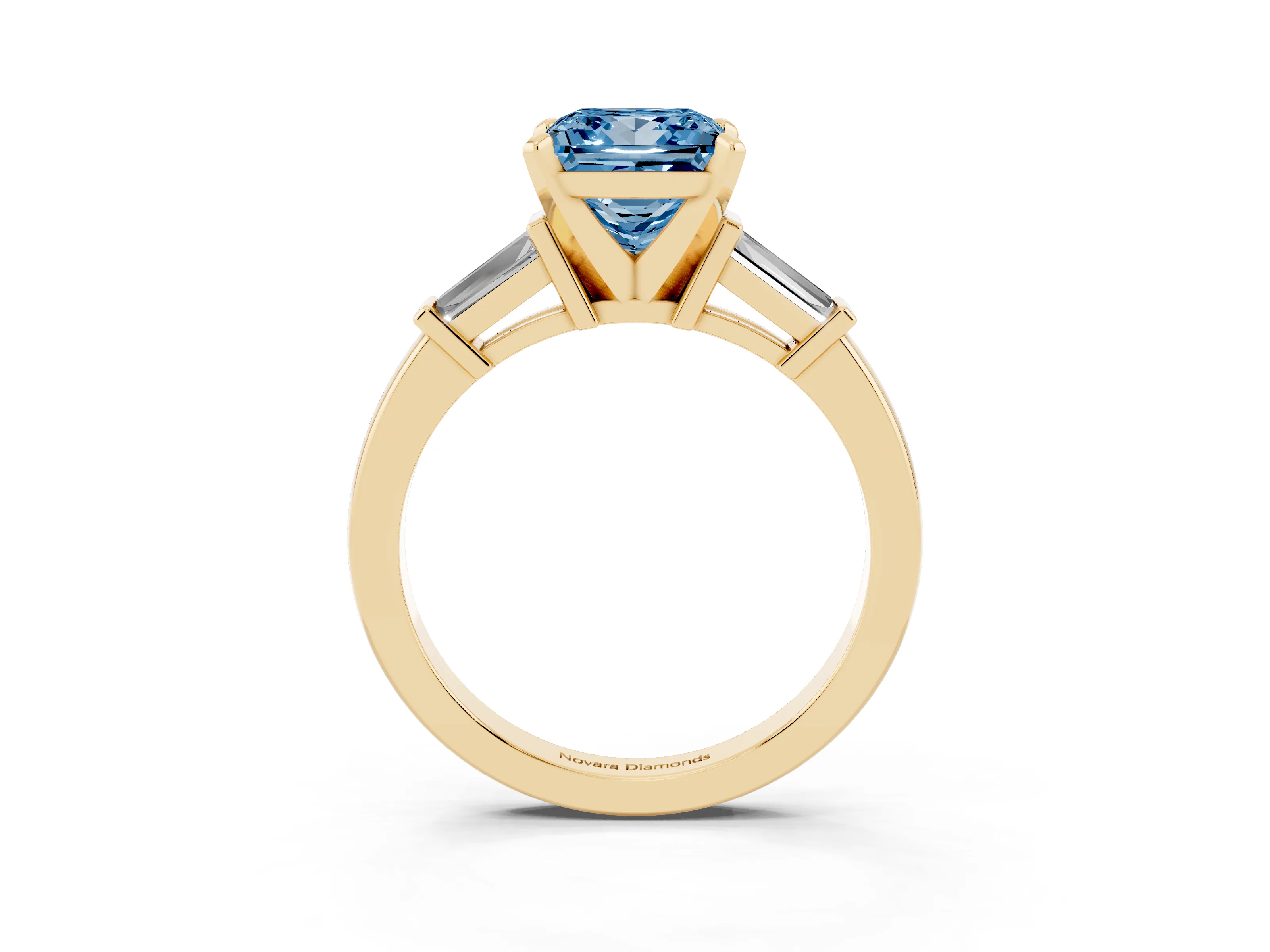 Fancy Blue Princess Cut Diamond Solitaire Ring Set in Yellow gold with Tapered Baguette Accents and Prong Setting