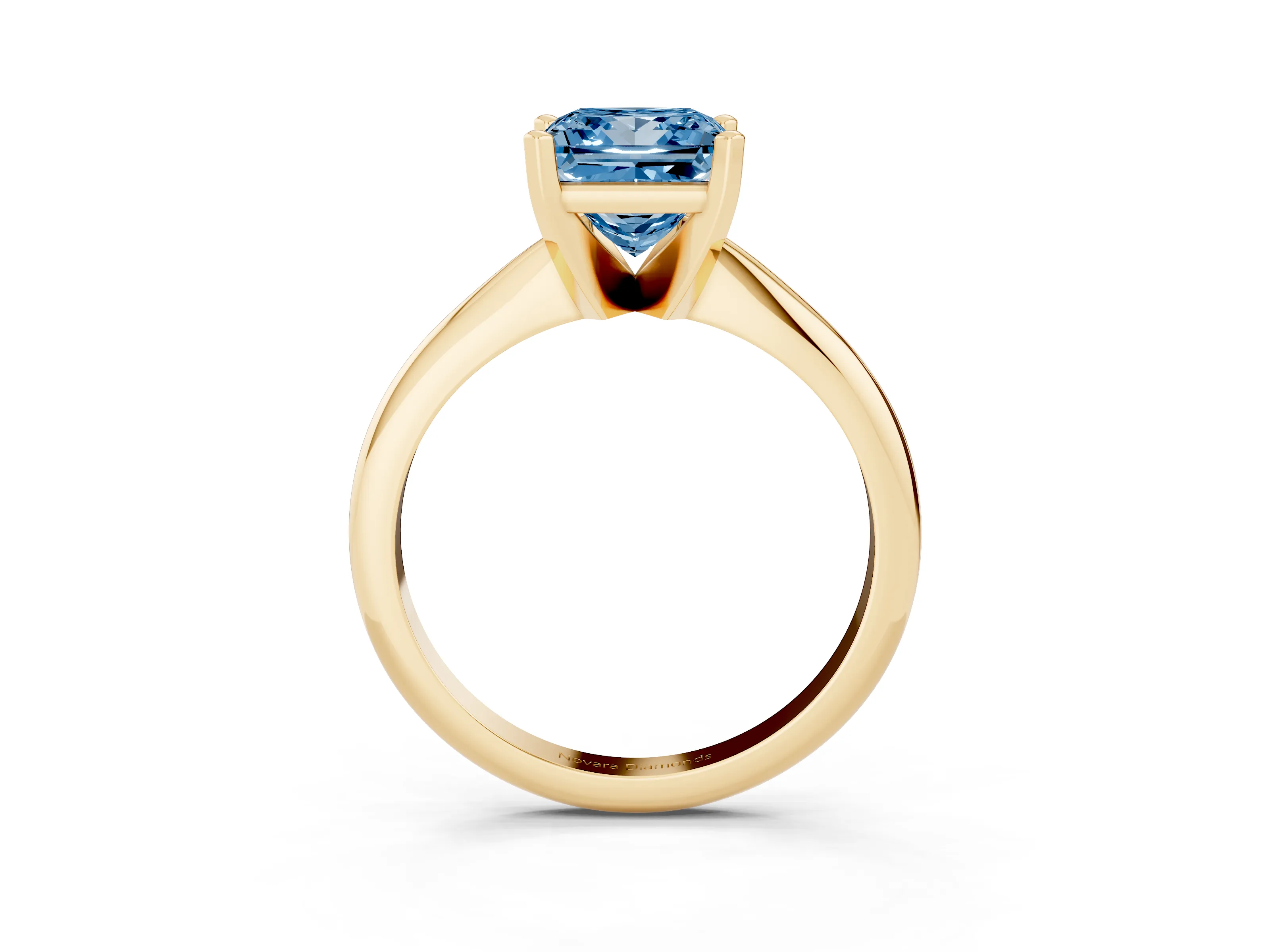 Fancy Blue Princess Cut Diamond Solitaire Ring Set in Yellow gold with Prong Setting on a Plain Round Band