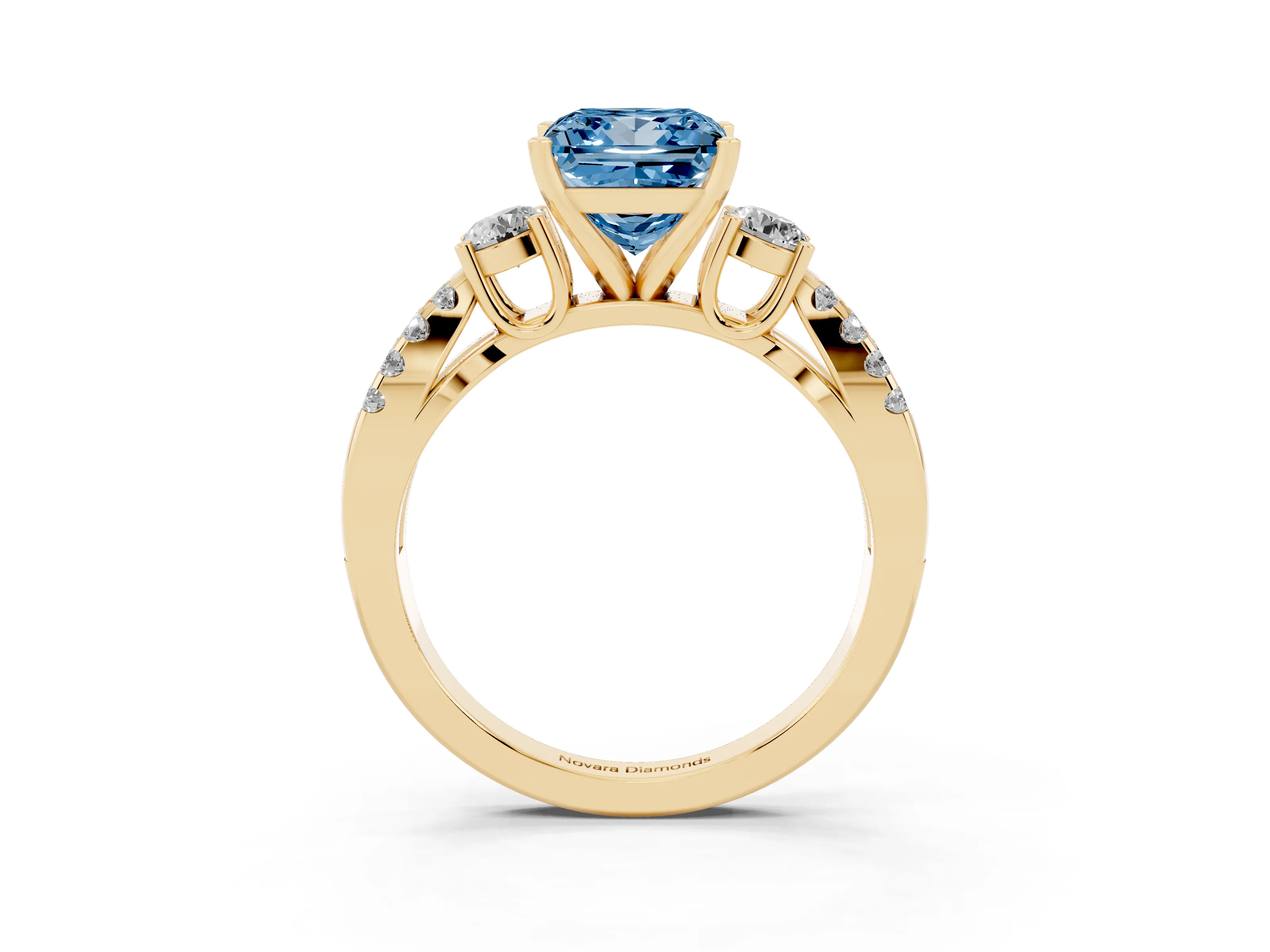 Fancy Blue Princess Cut Diamond Three-Stone Ring Set in Yellow gold with Pavé Split Shank and Prong Setting