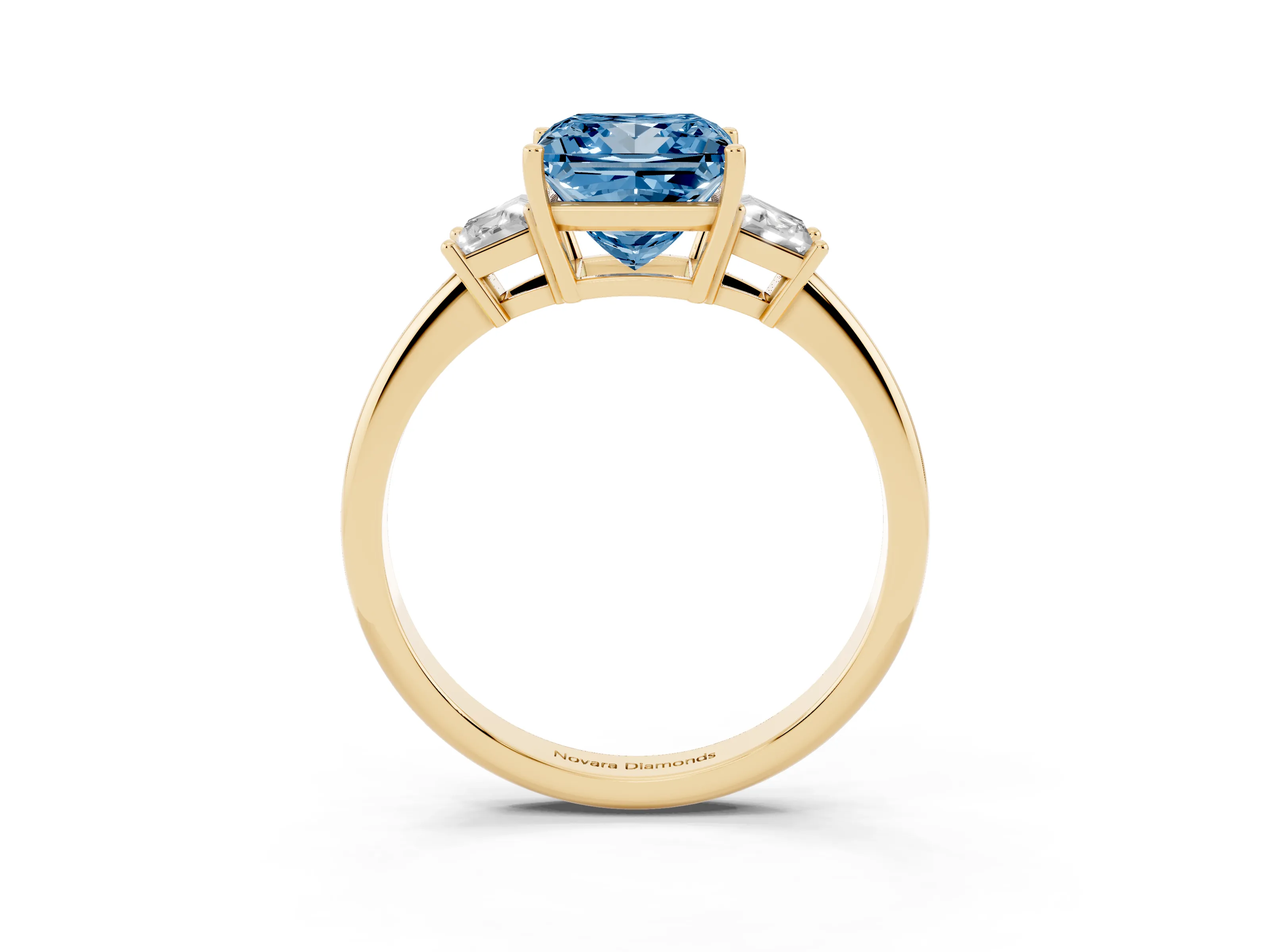 Fancy Blue Princess Cut Diamond Three-Stone Ring Set in Yellow gold with Trapezoid Side Stones and Prong Setting