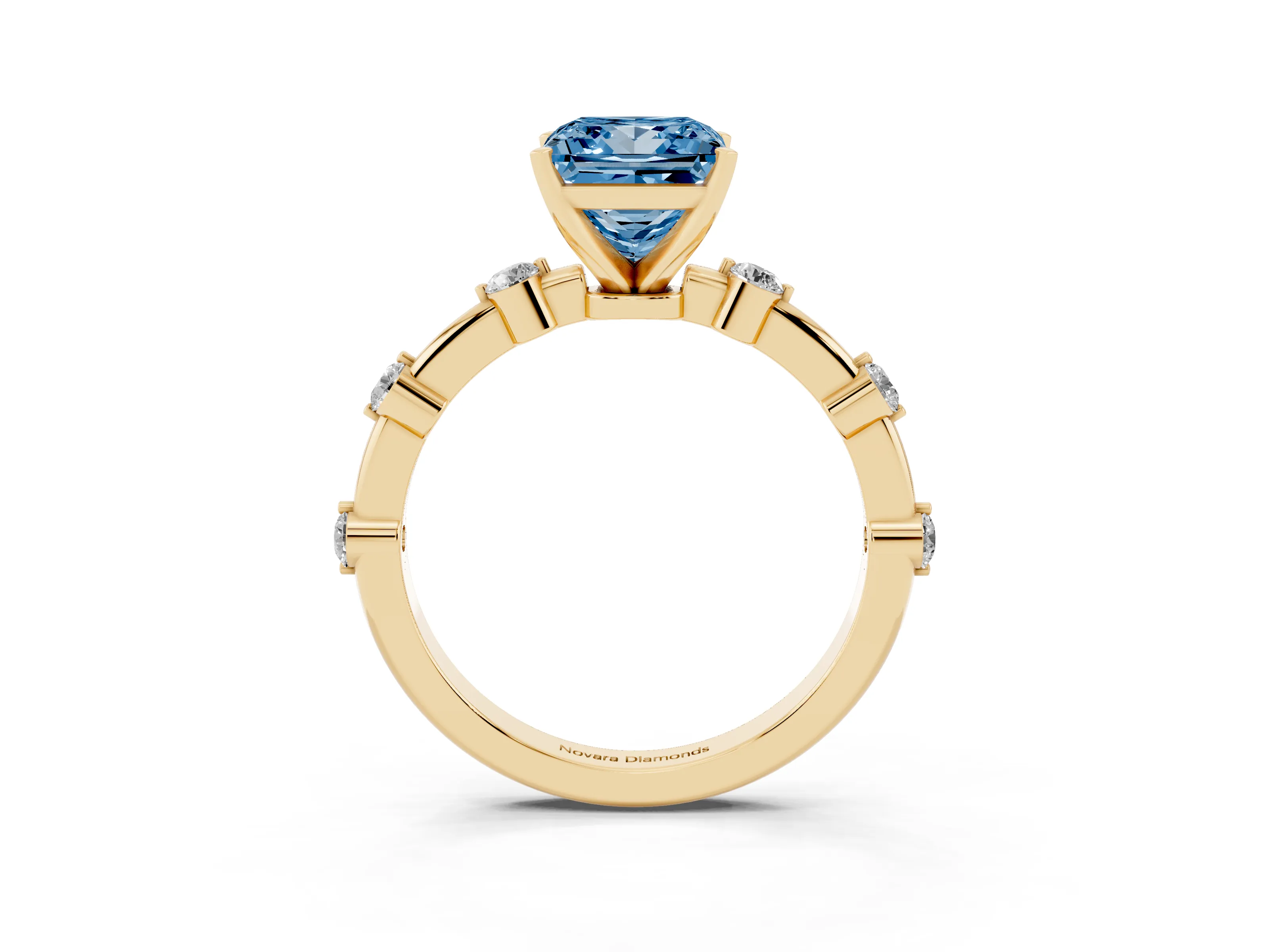 Fancy Blue Princess Cut Diamond Solitaire Ring Set in Yellow gold with Bezel Set Side Stones and Prong Setting