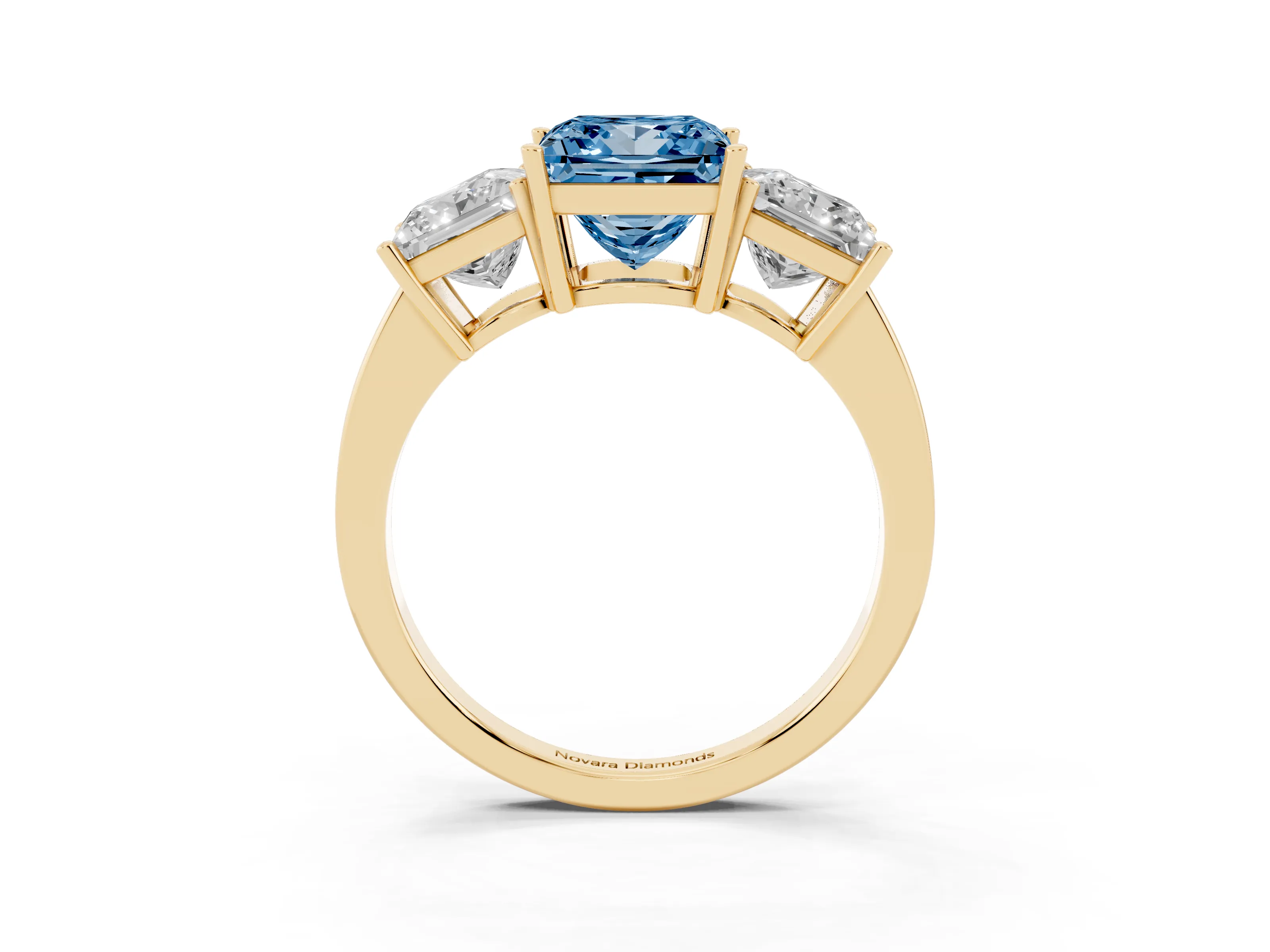Fancy Blue Princess Cut Diamond Three-Stone Engagement Ring Set in Yellow gold with Flat Band
