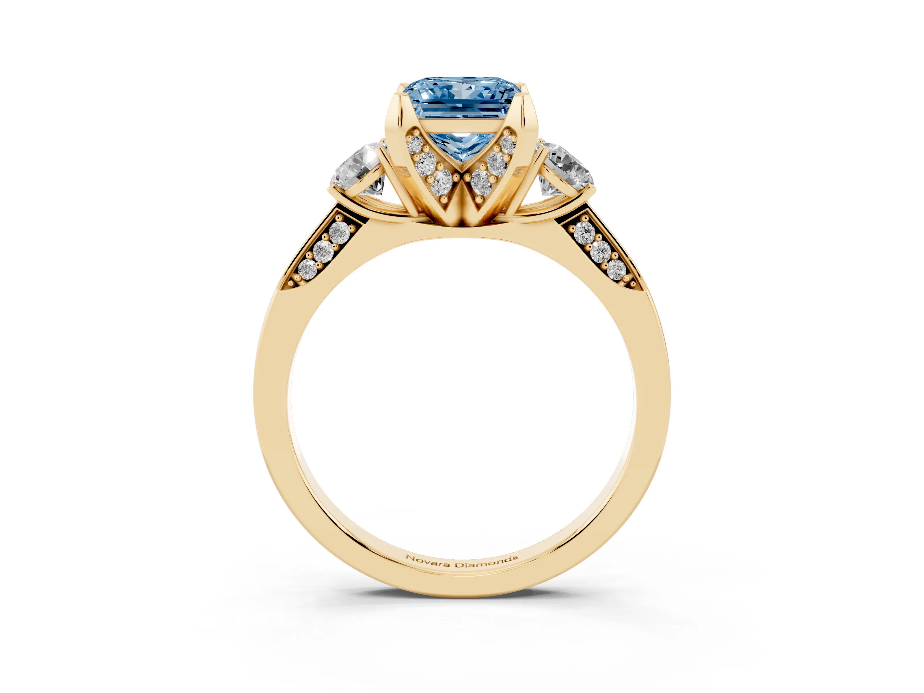 Fancy Blue Princess Cut Diamond Three-Stone Ring Set in Yellow gold with Pavé Band and Smaller Side Stones