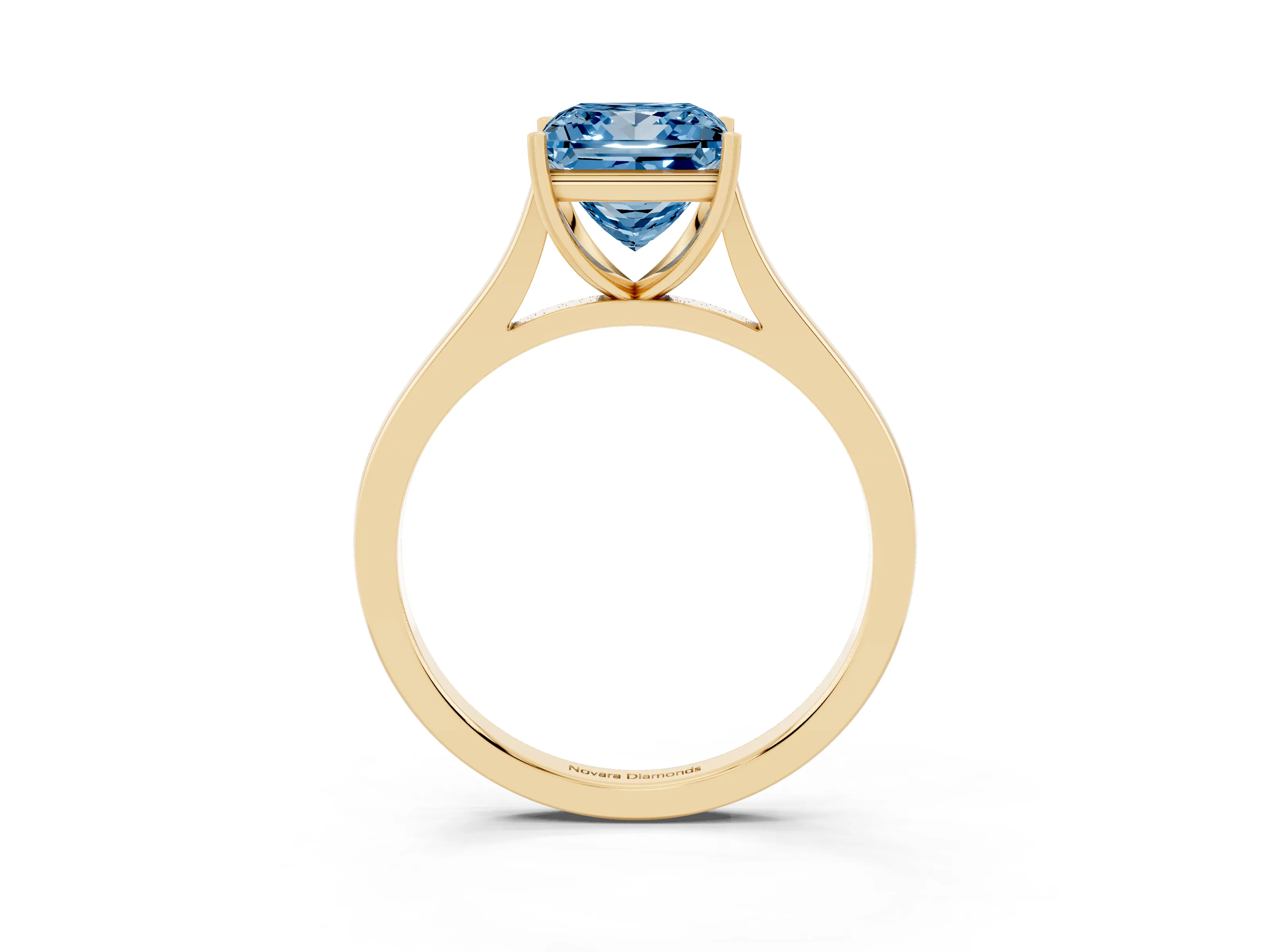Fancy Blue Princess Cut Diamond Solitaire Heart Prong Engagement Ring Set in Yellow gold with Tapered Band