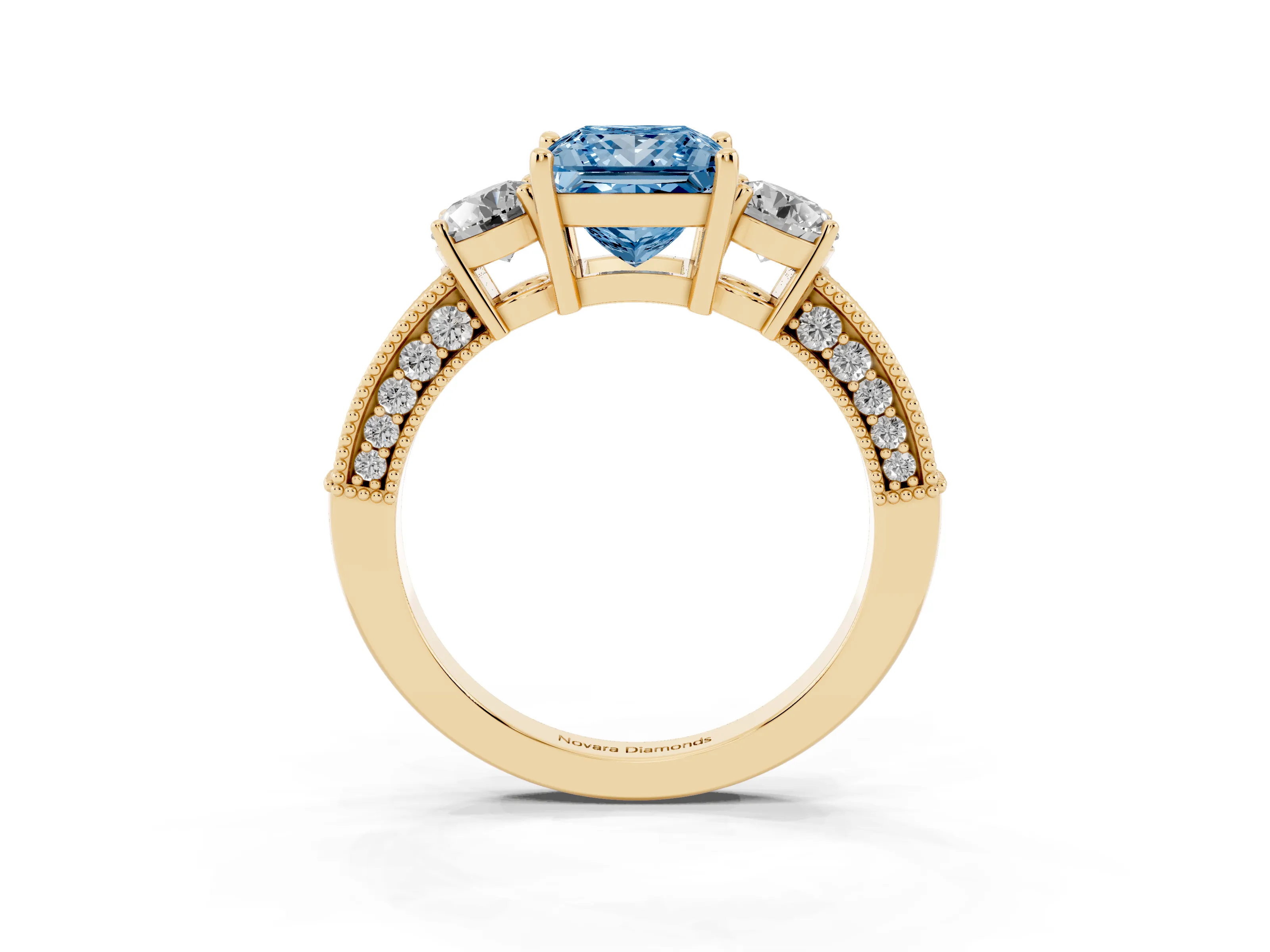 Fancy Blue Princess Cut Diamond Three-Stone Ring Set in Yellow gold with Round Side Stones and Pavé Band
