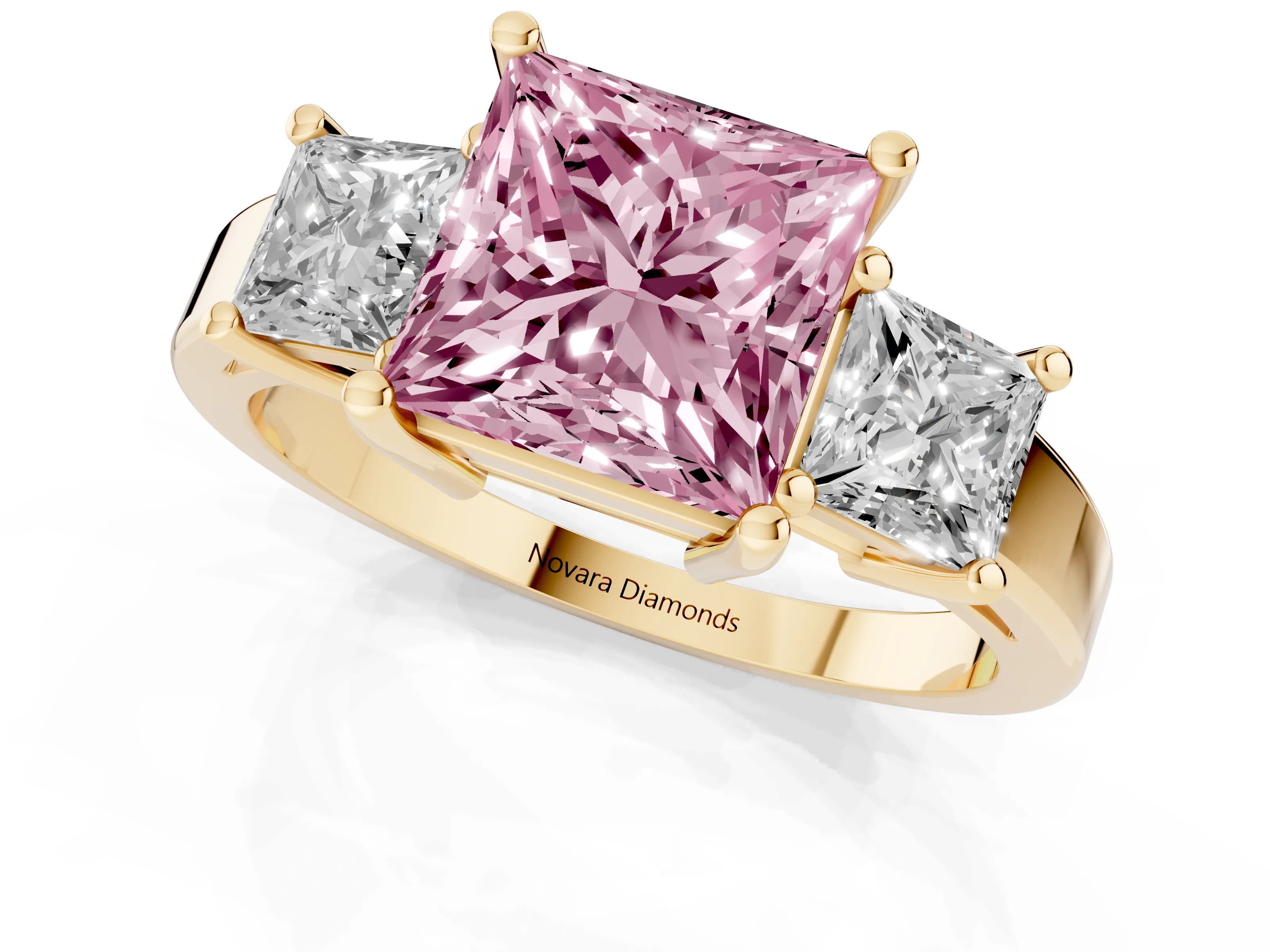 Fancy Pink Three-Stone Princess Cut Diamond Solitaire Ring Set in Yellow gold with Prong Setting