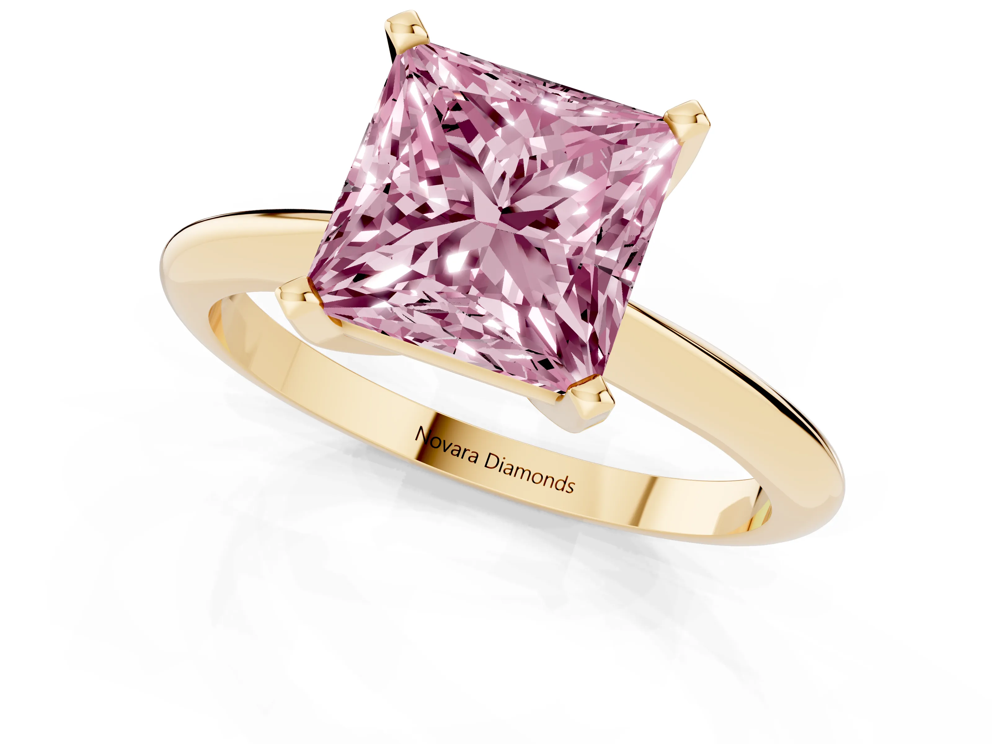 Fancy Pink Princess Cut Diamond Solitaire Ring Set in Yellow gold with Prong Setting on a Plain Round Band