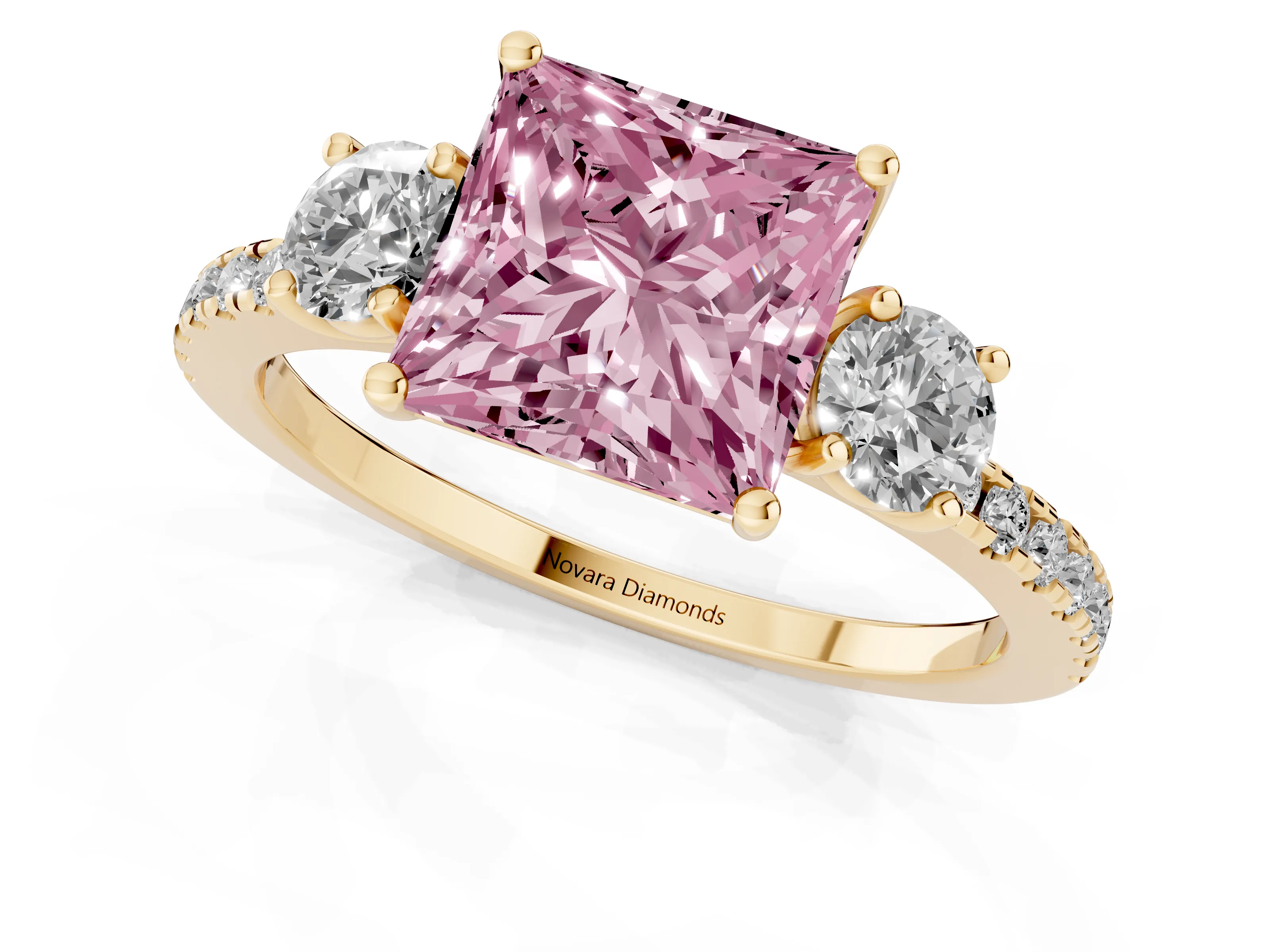 Fancy Pink Princess Cut Diamond Three-Stone Ring Set in Yellow gold with Pavé Band and Graduated Sides