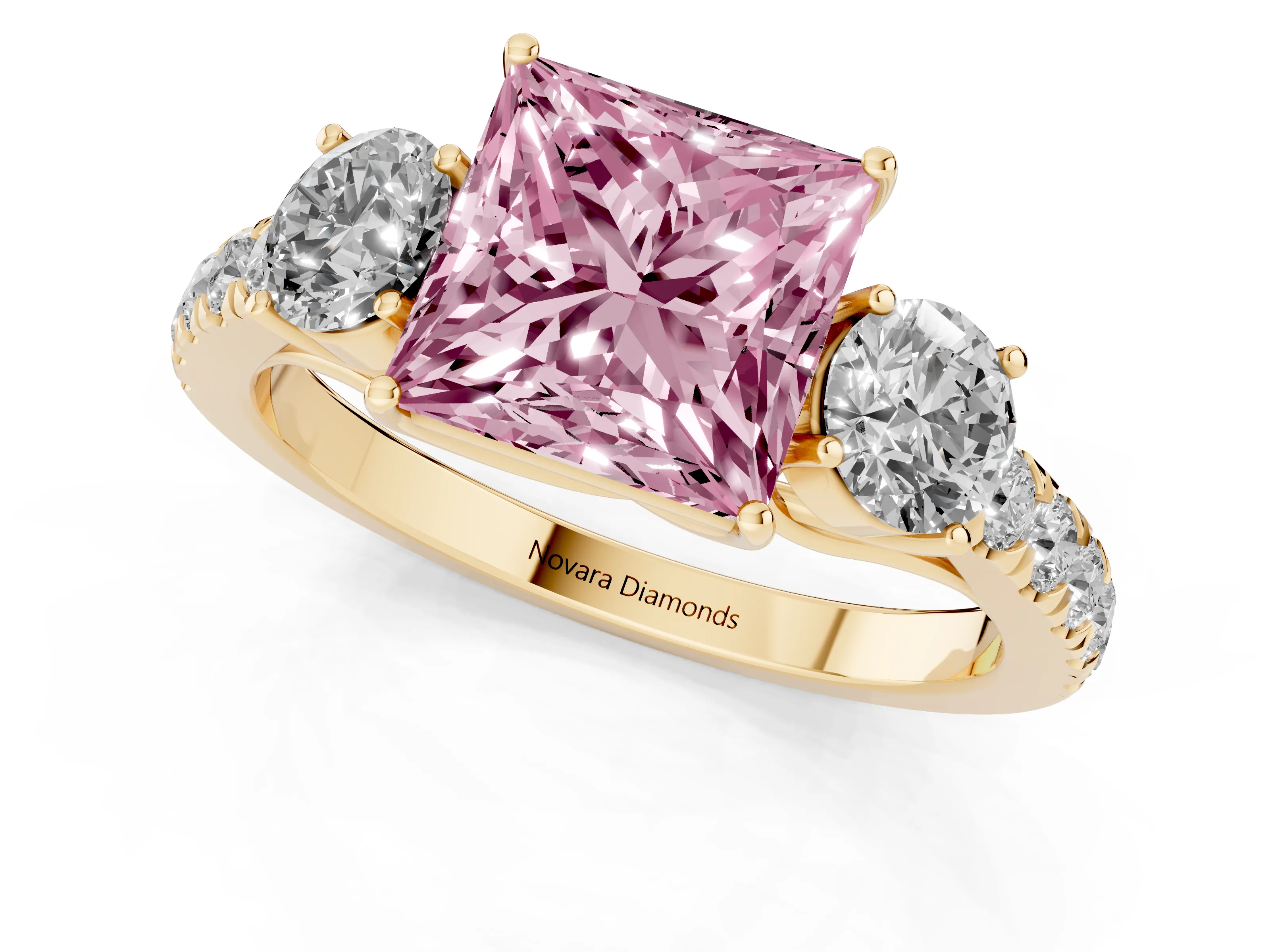 Fancy Pink Princess Cut Diamond Three-Stone Ring Set in Yellow gold with Round Side Stones and Delicate Pavé Band