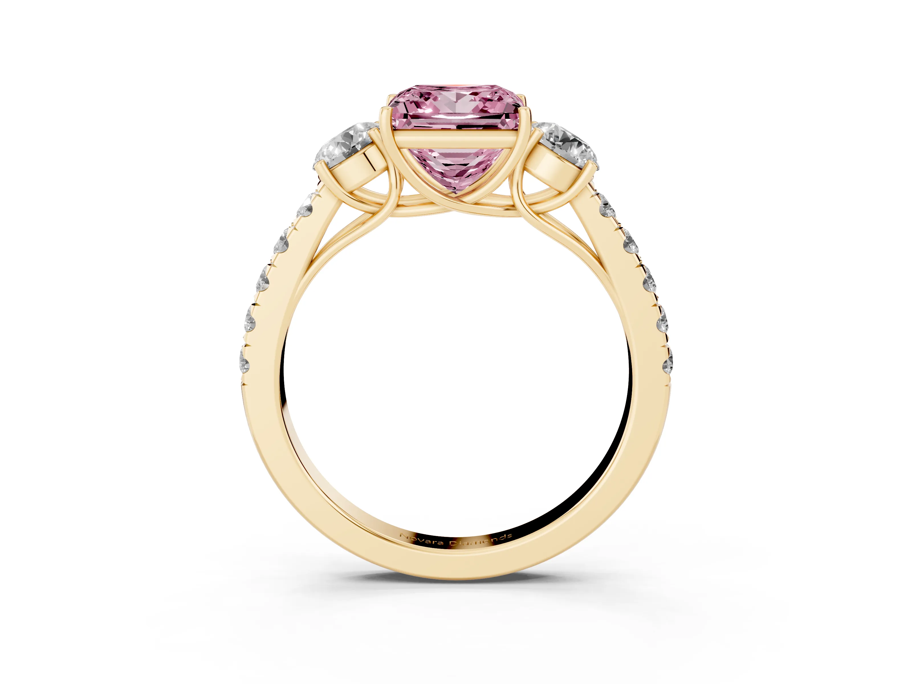 Fancy Pink Princess Cut Diamond Three-Stone Ring Set in Yellow gold with Round Side Stones and Delicate Pavé Band