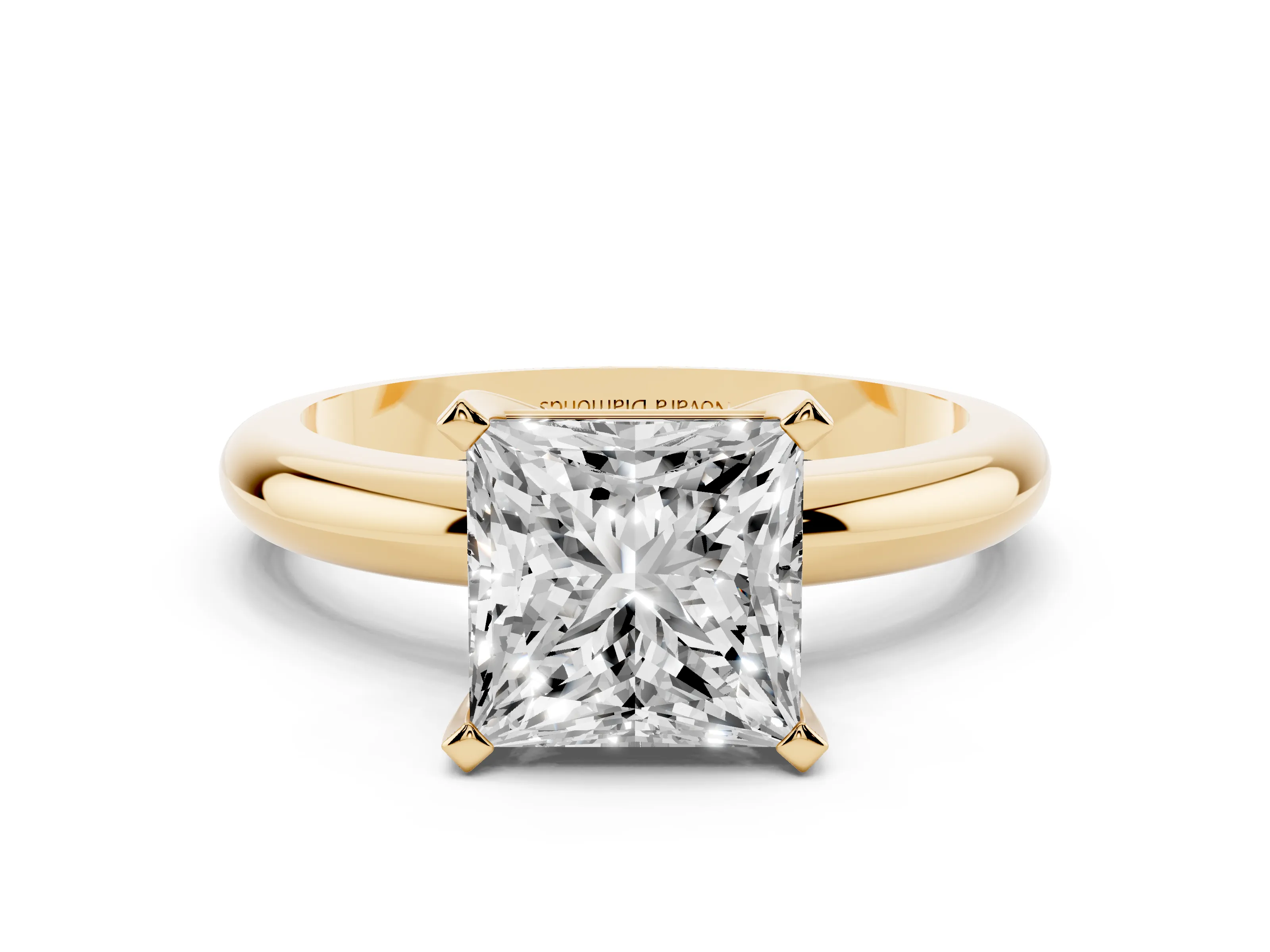 Princess Cut Diamond Solitaire Engagement Ring Set in Yellow gold with Round Band and Prong Setting