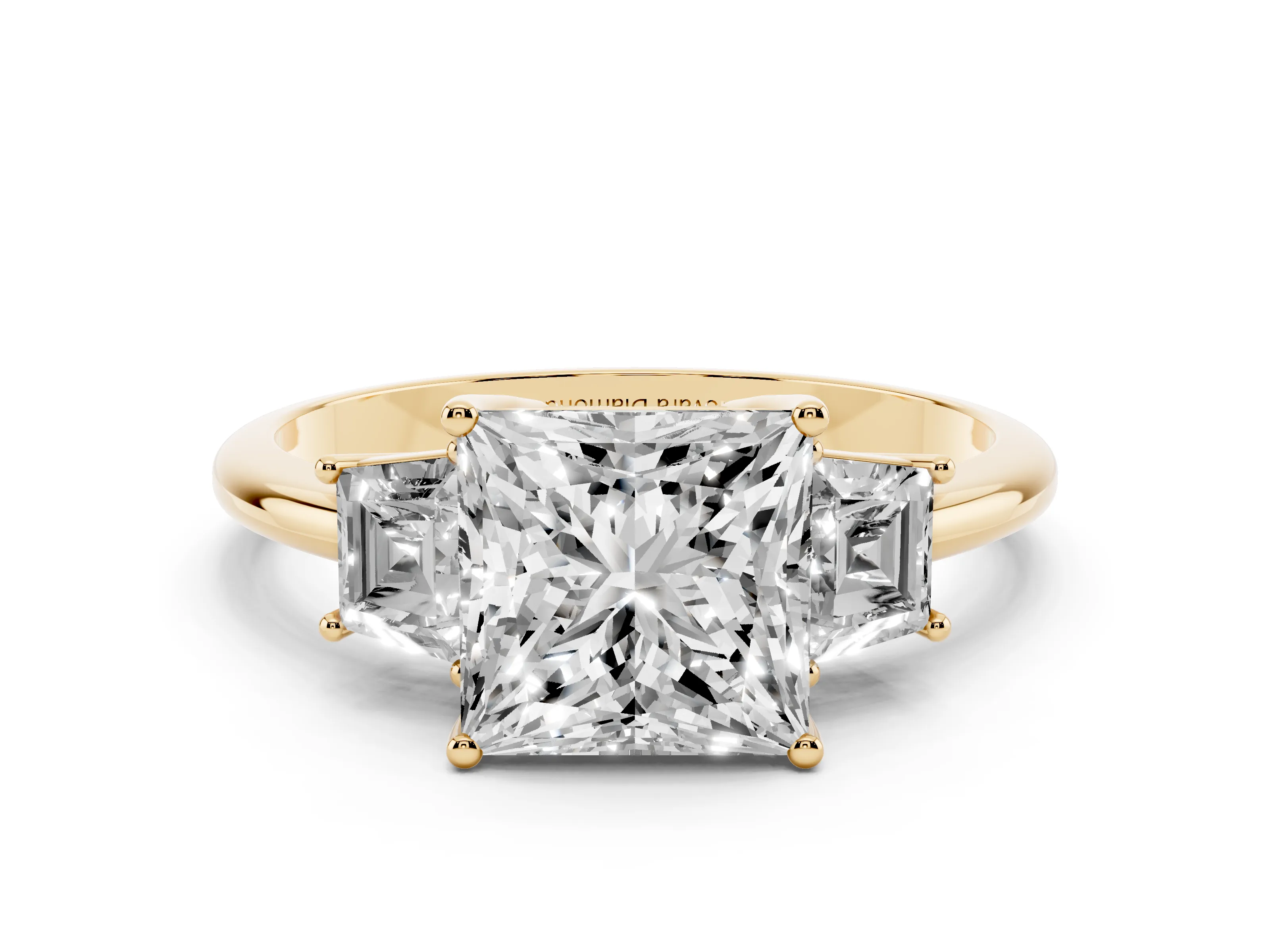 Princess Cut Diamond Three-Stone Ring Set in Yellow gold with Trapezoid Side Stones and Prong Setting