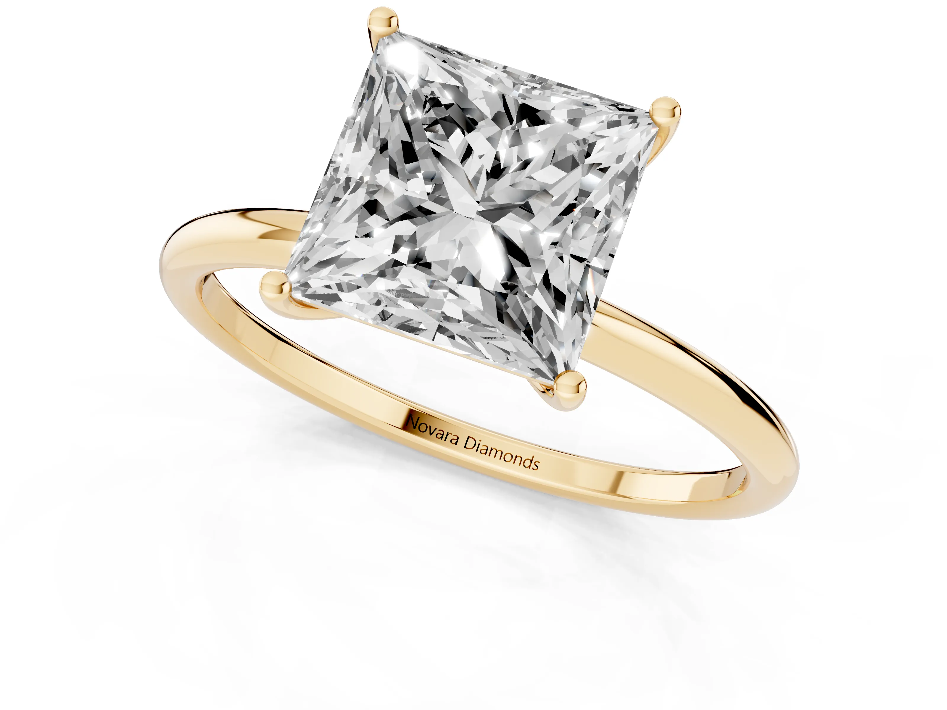 Princess Cut Diamond Solitaire Engagement Ring Set in Yellow gold with Thin Band and Prong Setting