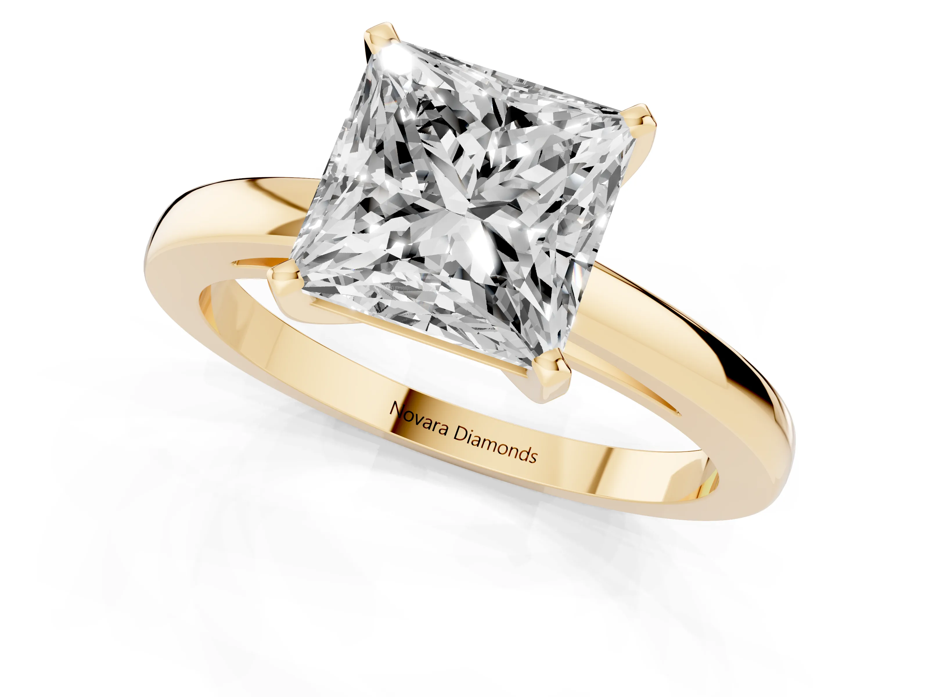 Princess Cut Diamond Solitaire Engagement Ring Set in Yellow gold with Prong Setting on a Classic Band