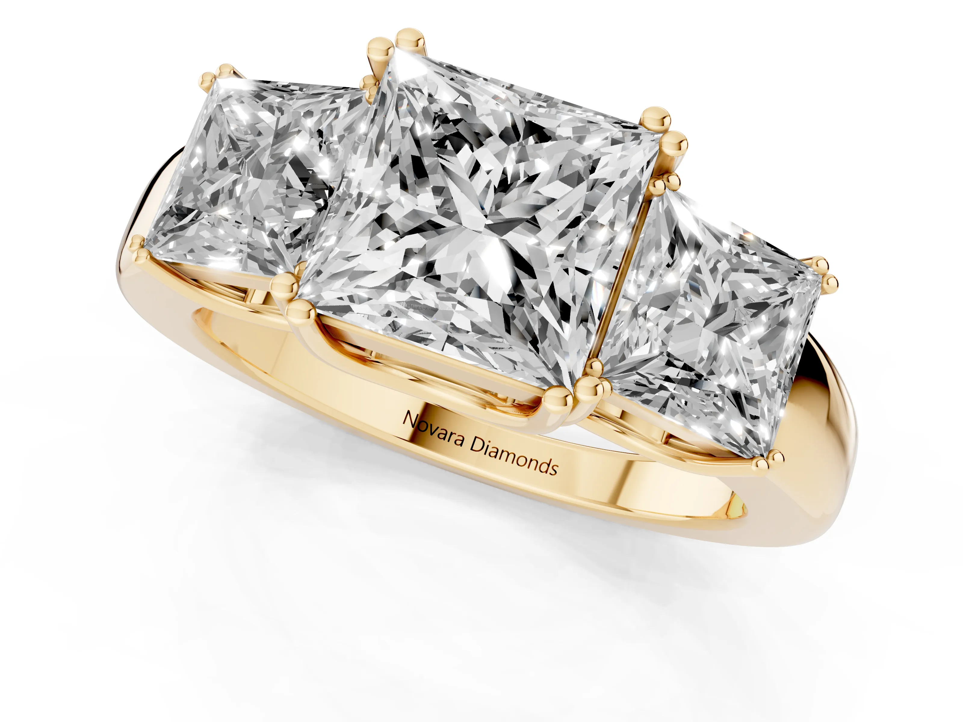 Princess Cut Diamond Three-Stone Ring Set in Yellow gold with Polished Channel-Set Band