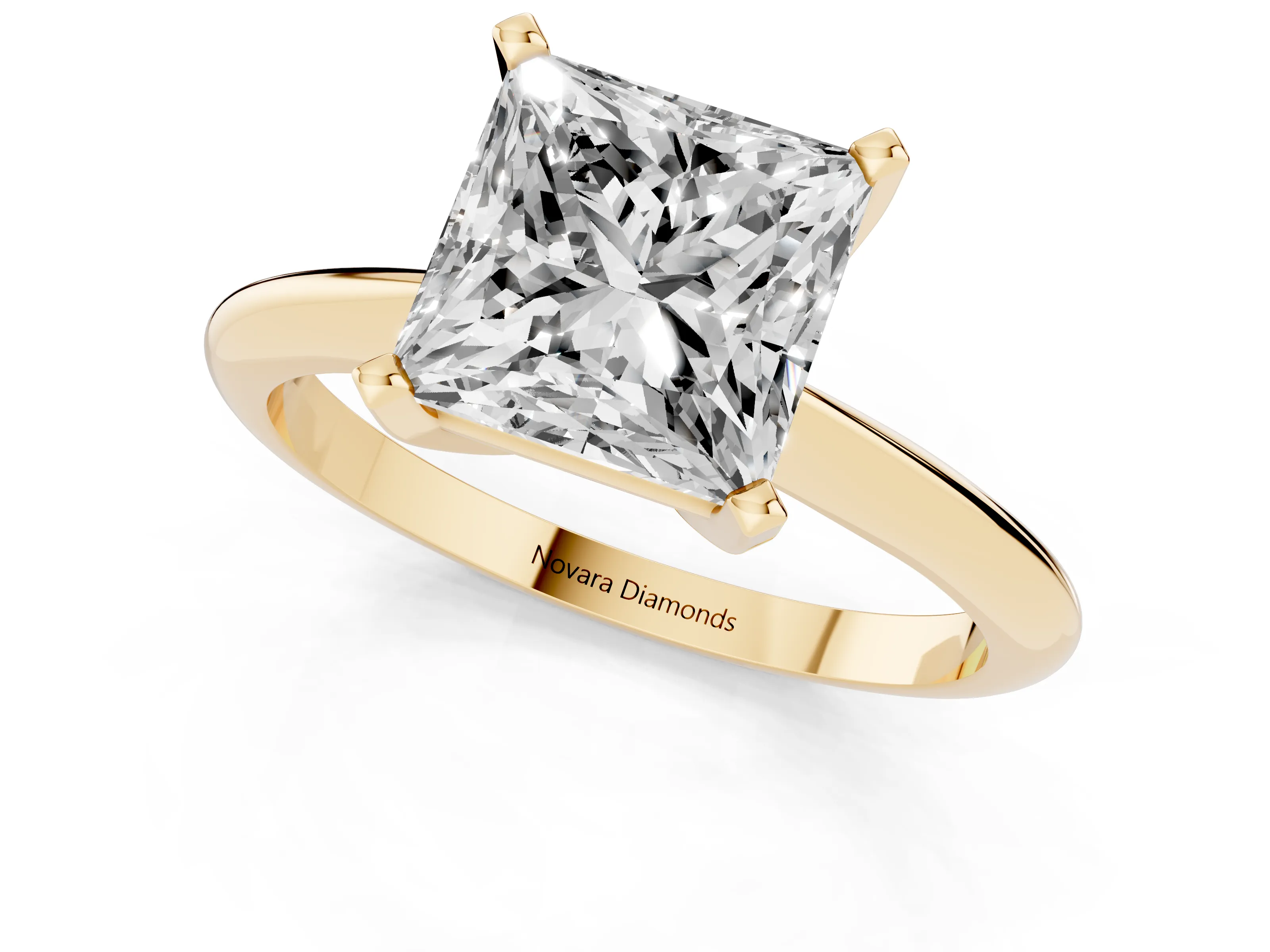 Princess Cut Diamond Solitaire Ring Set in Yellow gold with Prong Setting on a Plain Round Band