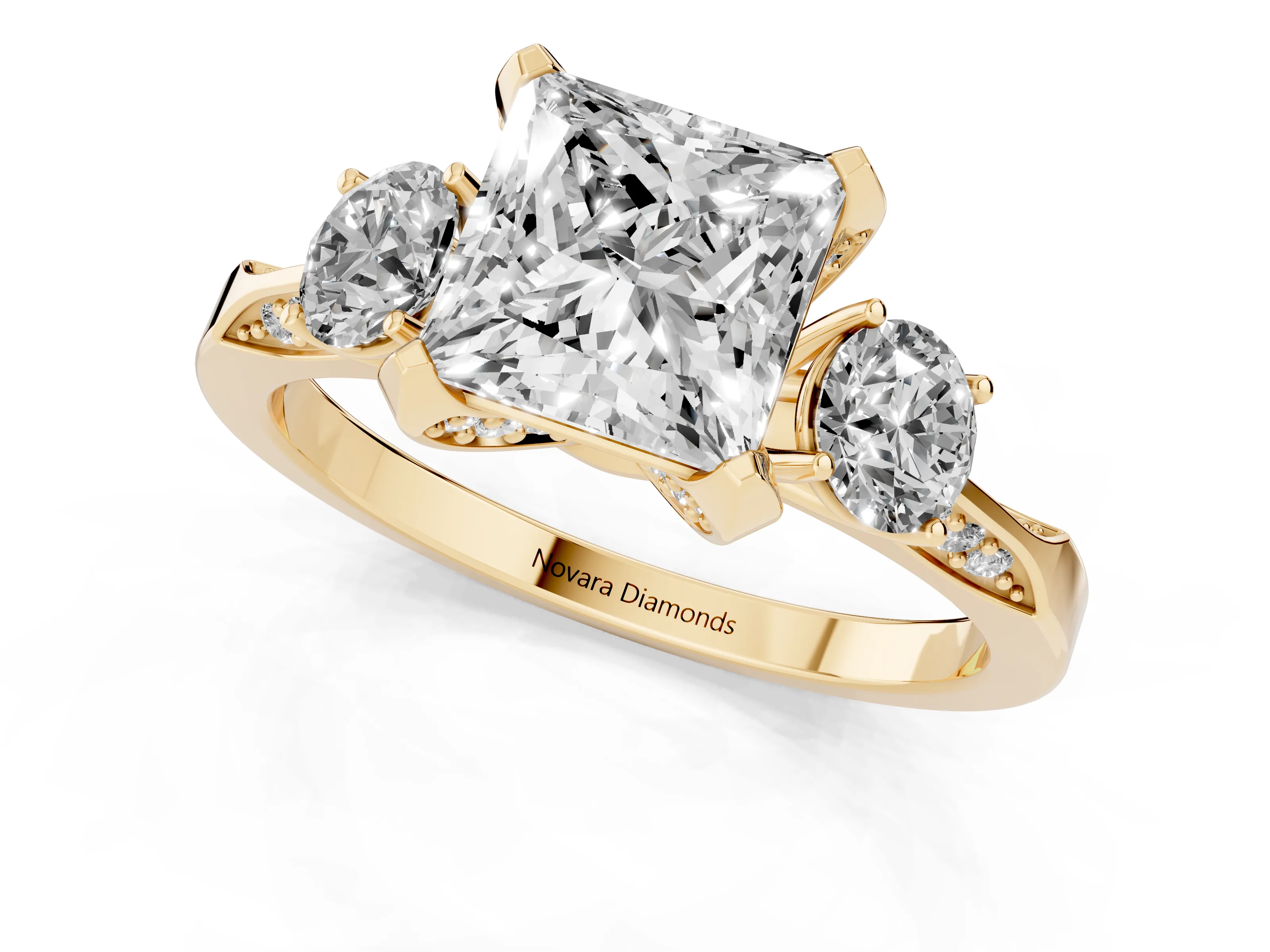 Princess Cut Diamond Three-Stone Ring Set in Yellow gold with Pavé Band and Smaller Side Stones